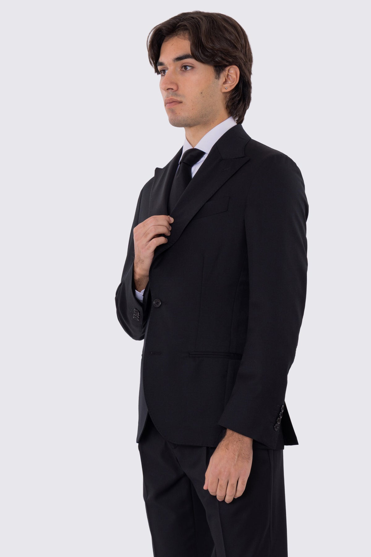 Abito uomo Monopetto nero fresco lana super 110's Tessuti in esclusiva Sartoria Carillo completamente sfoderato con Rever a lancia e tasche a filetto