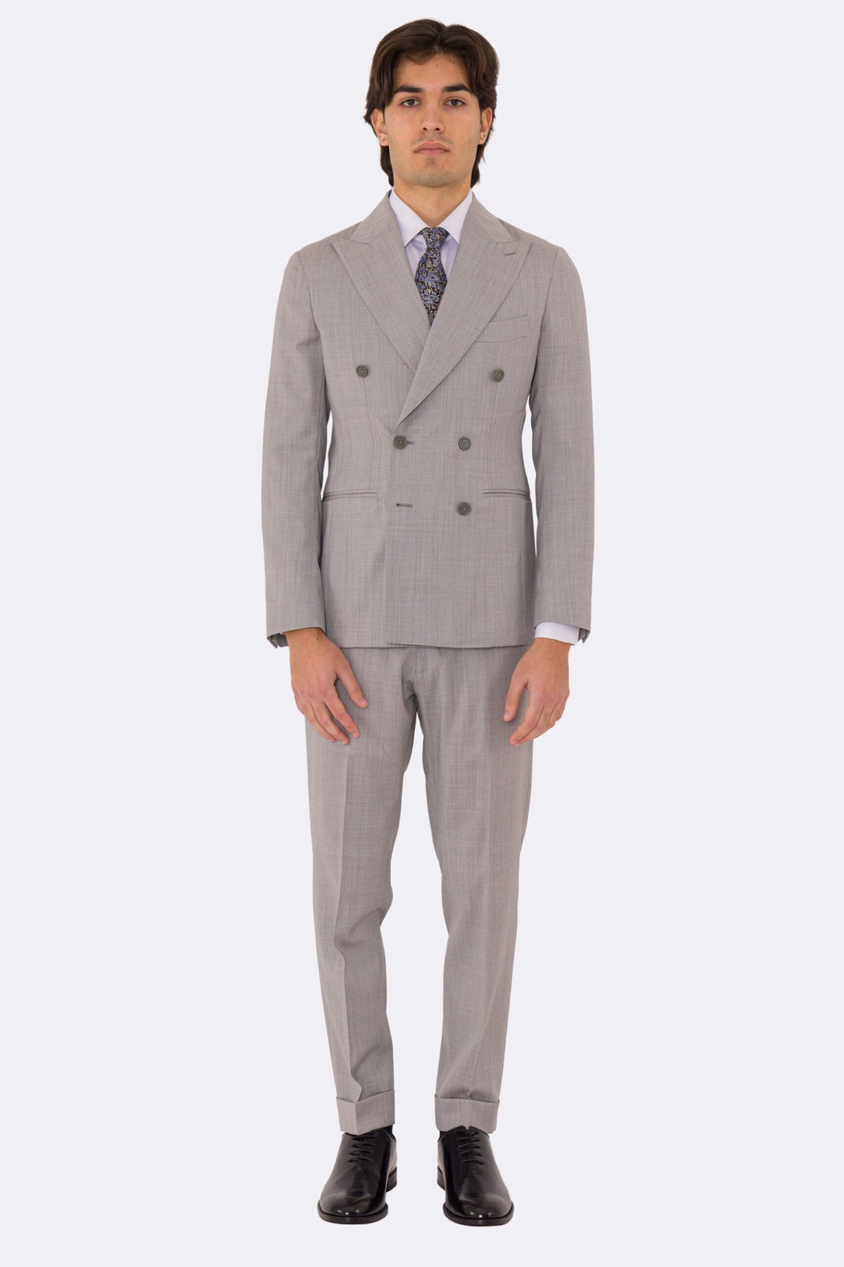 Abito uomo Doppiopetto grigio chiaro fresco lana super 110's Tessuti in esclusiva Sartoria Carillo completamente sfoderato con Rever a lancia e tasche a filetto
