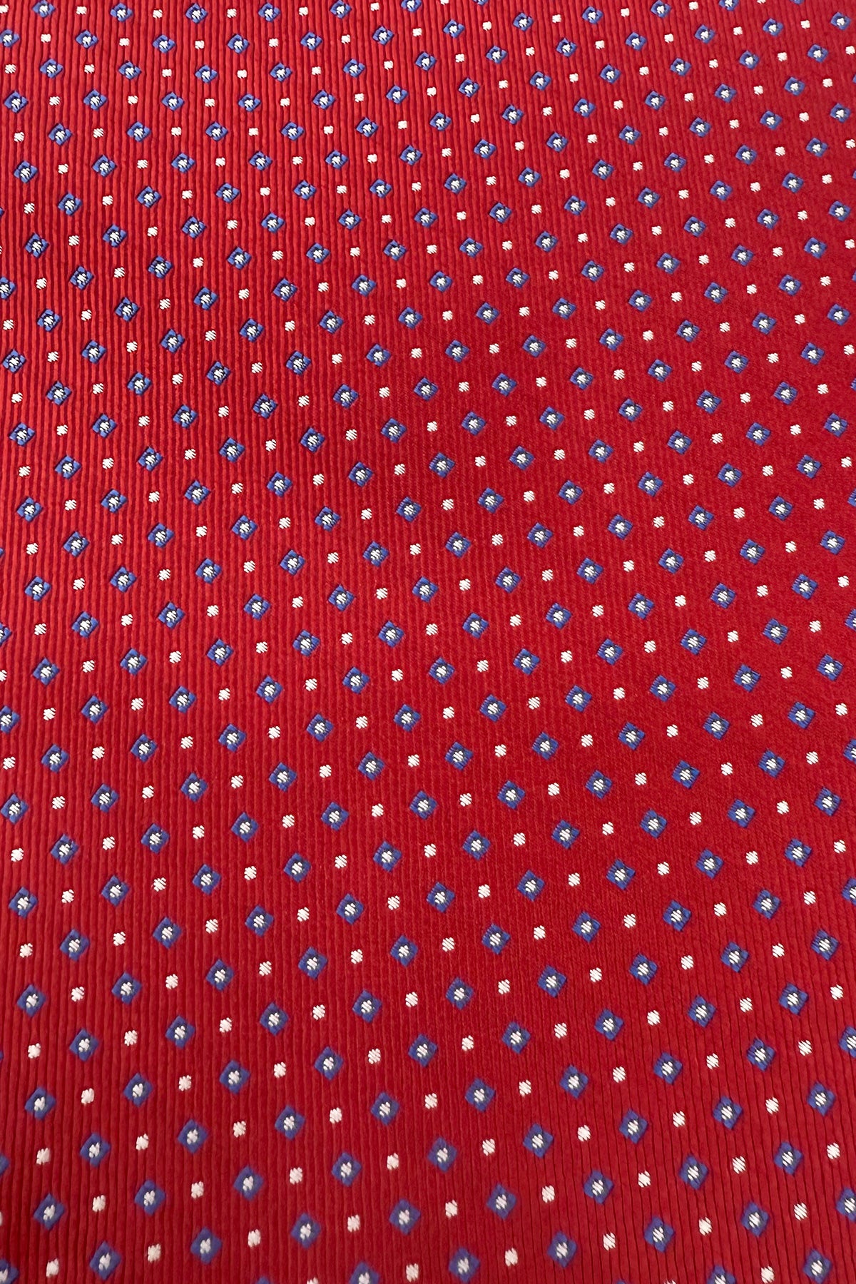 Pochette uomo bordeaux fantasia con bordino per giacca.