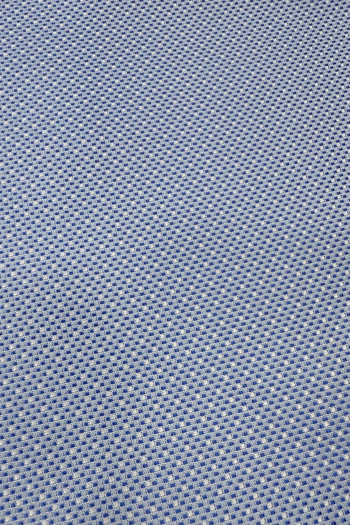 Pochette uomo celeste fantasia con bordino per giacca.