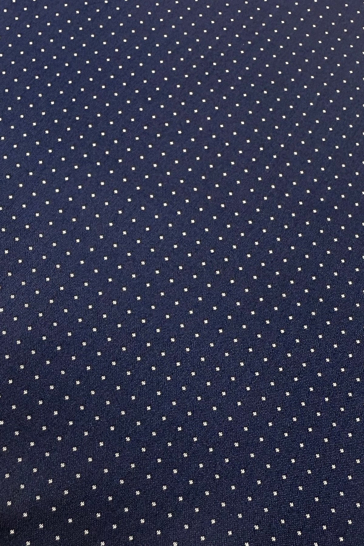Pochette uomo blu fantasia con bordino per giacca.