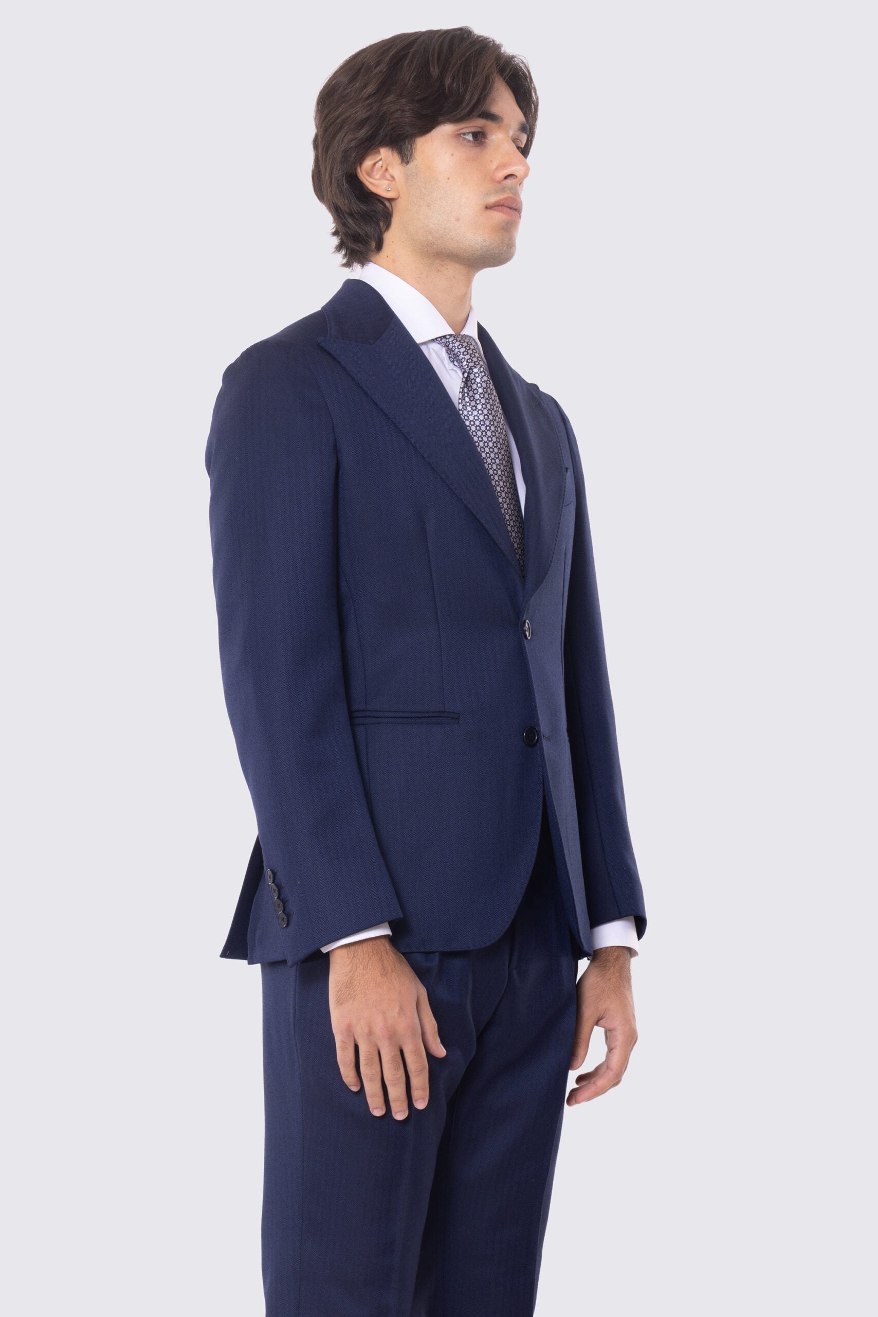 Abito blu spigato con giacca monopetto con rever a lancia e pantalone vita alta con fibbie laterali 100% lana Flanella Holland & Sherry