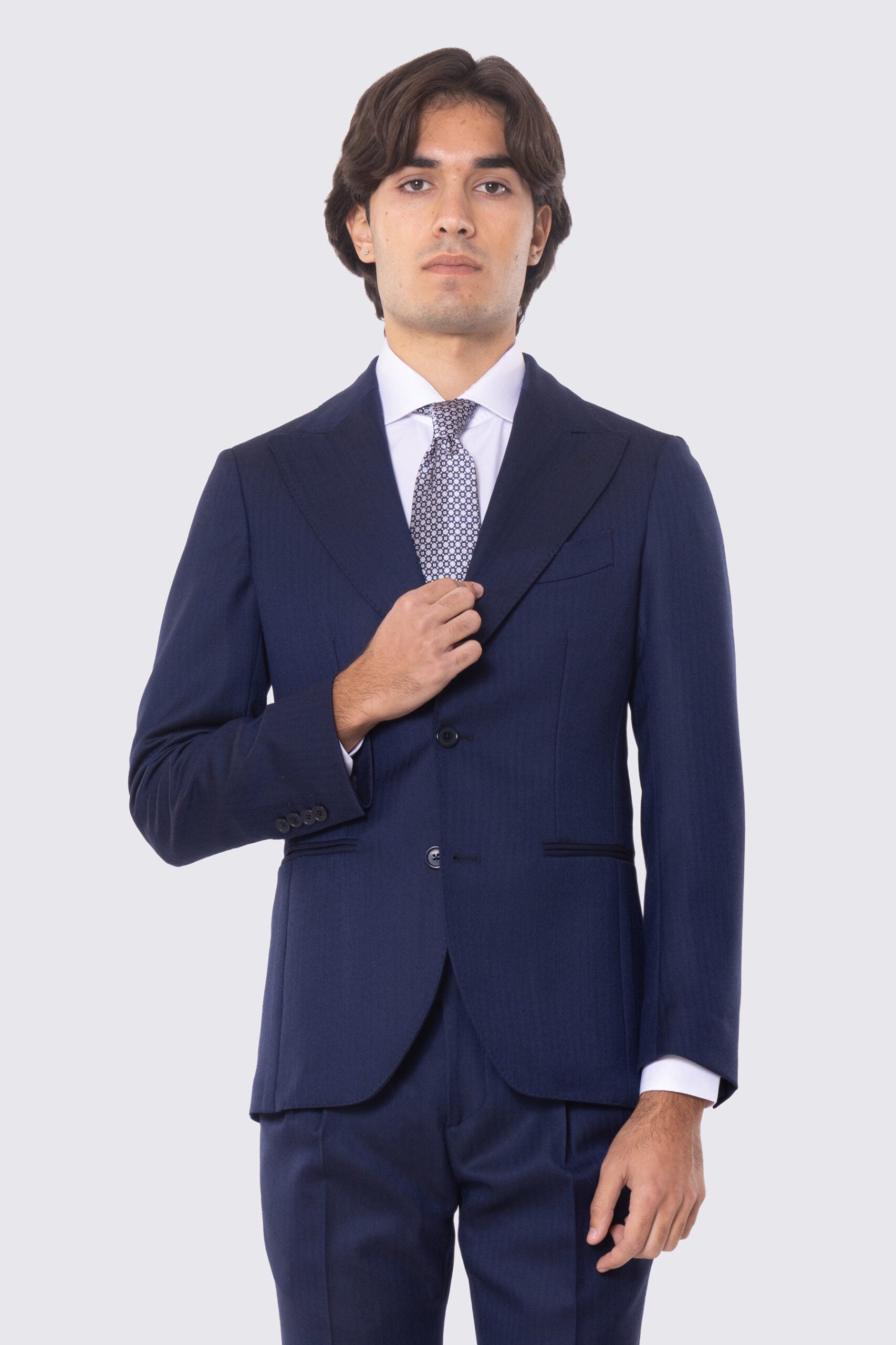 Abito blu spigato con giacca monopetto con rever a lancia e pantalone vita alta con fibbie laterali 100% lana Flanella Holland & Sherry