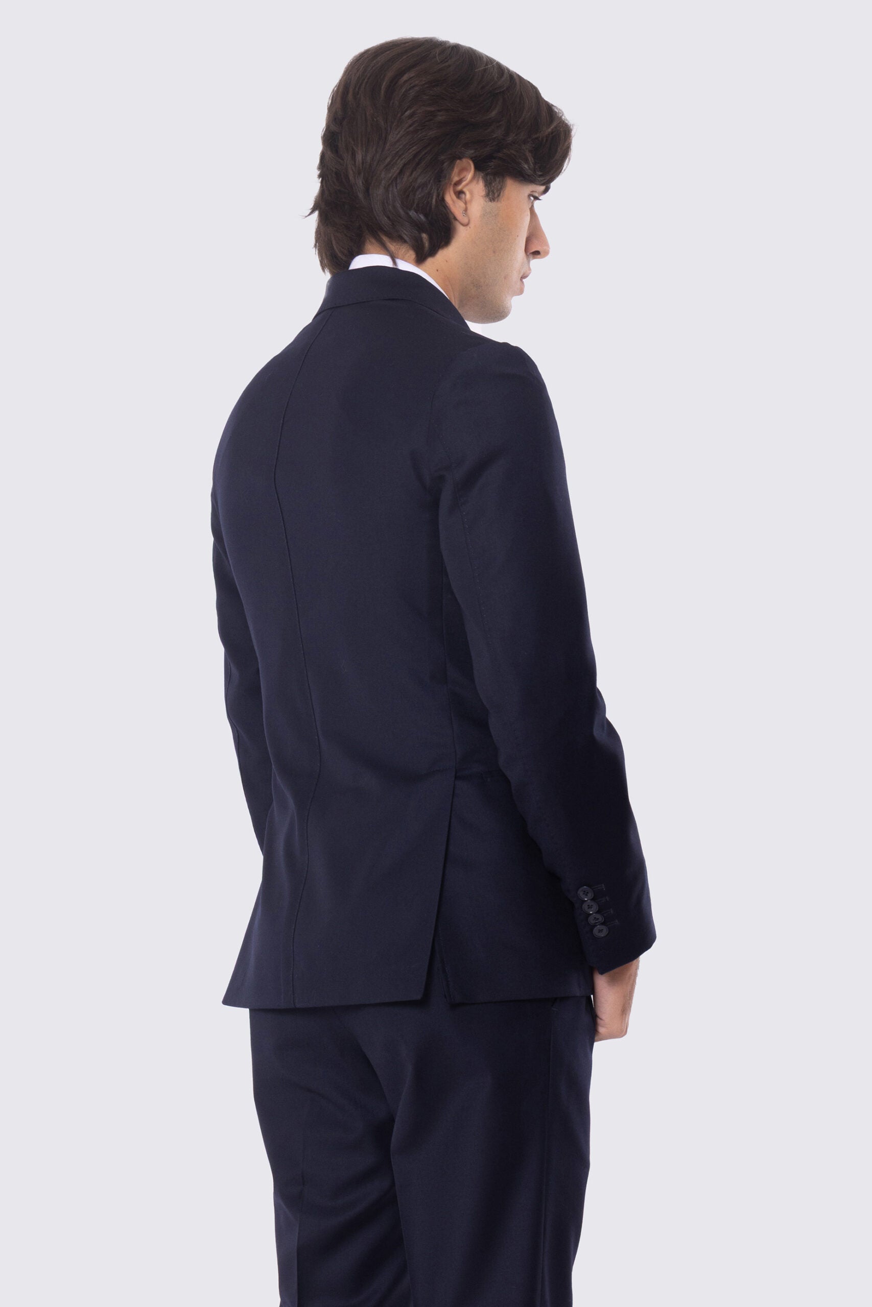 Abito blu notte con giacca Doppiopetto rever a lancia tasche a filo e pantalone vita alta con doppie pinces e risvolto 5cm 100% lana Flanella Carillo Drapers