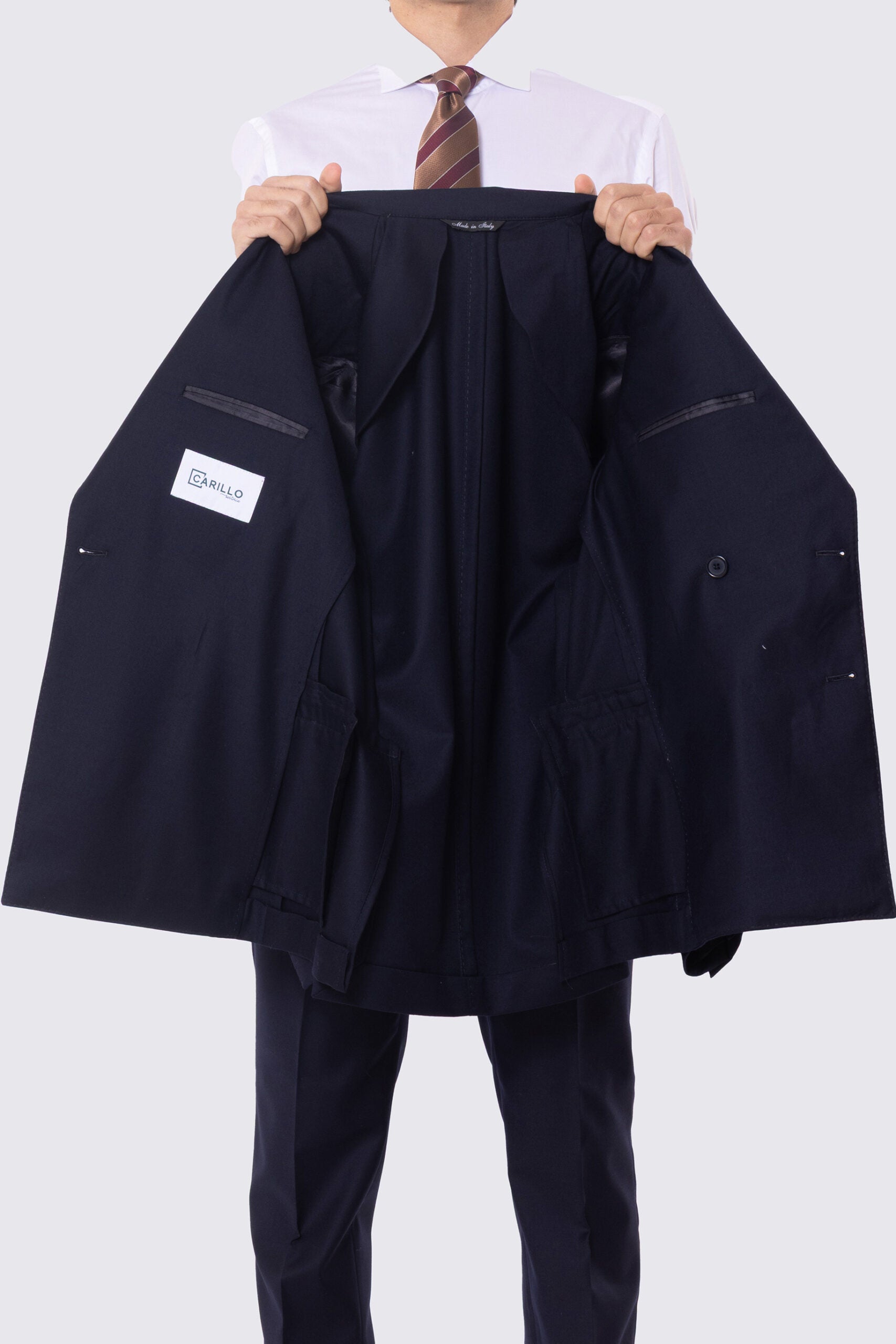 Abito blu notte con giacca Doppiopetto rever a lancia tasche a filo e pantalone vita alta con doppie pinces e risvolto 5cm 100% lana Flanella Carillo Drapers