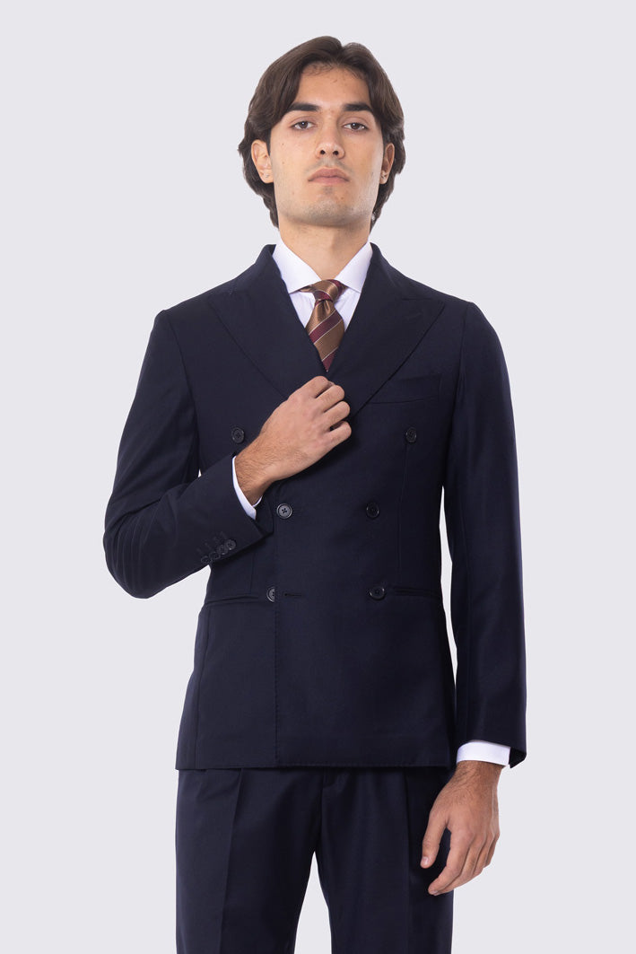 Abito blu notte con giacca Doppiopetto rever a lancia tasche a filo e pantalone vita alta con doppie pinces e risvolto 5cm 100% lana Flanella Carillo Drapers