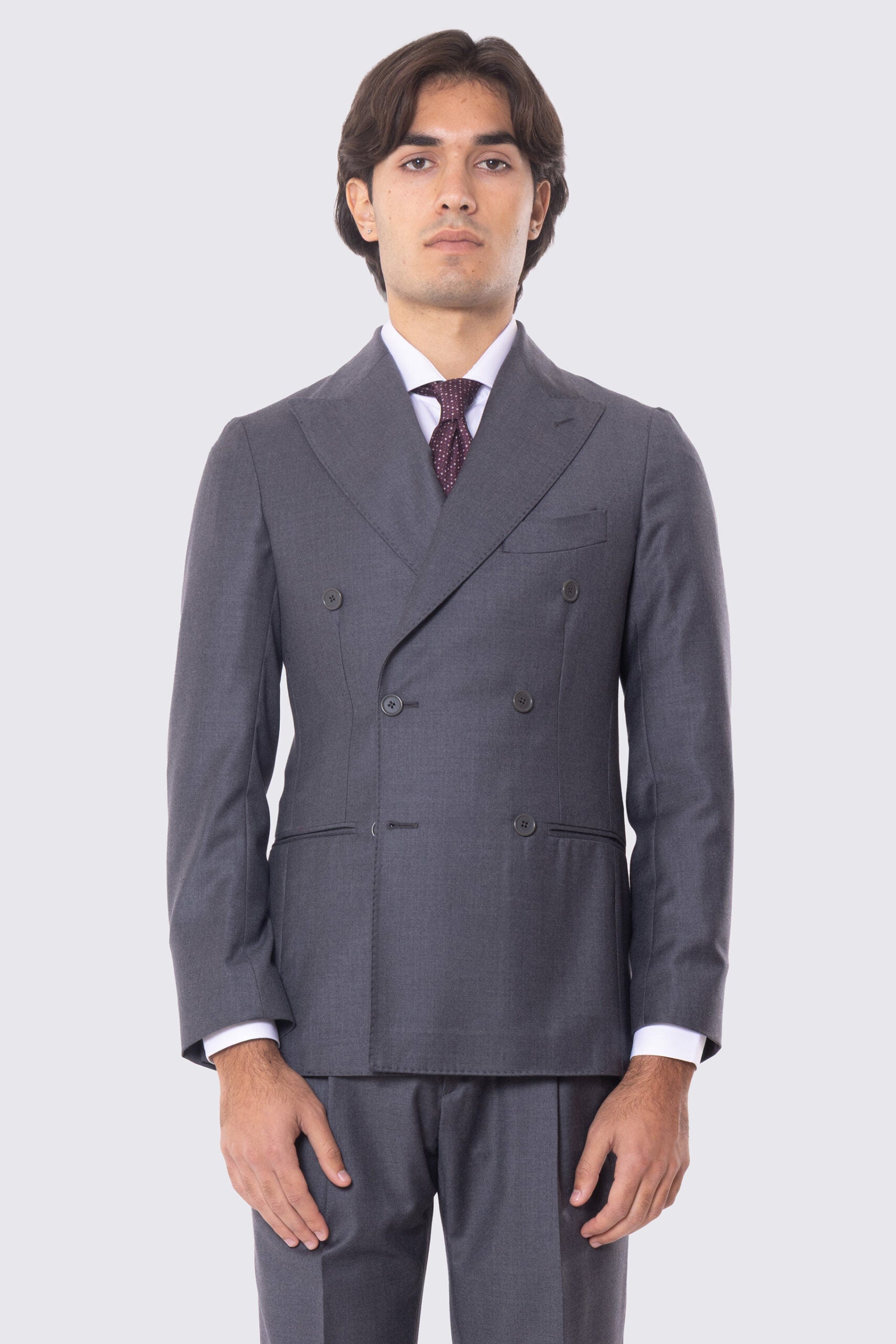 Abito grigio con giacca Doppiopetto rever a lancia tasche a filo e pantalone vita alta con doppia pinces e risvolto 5cm 100% lana Flanella Carillo Drapers