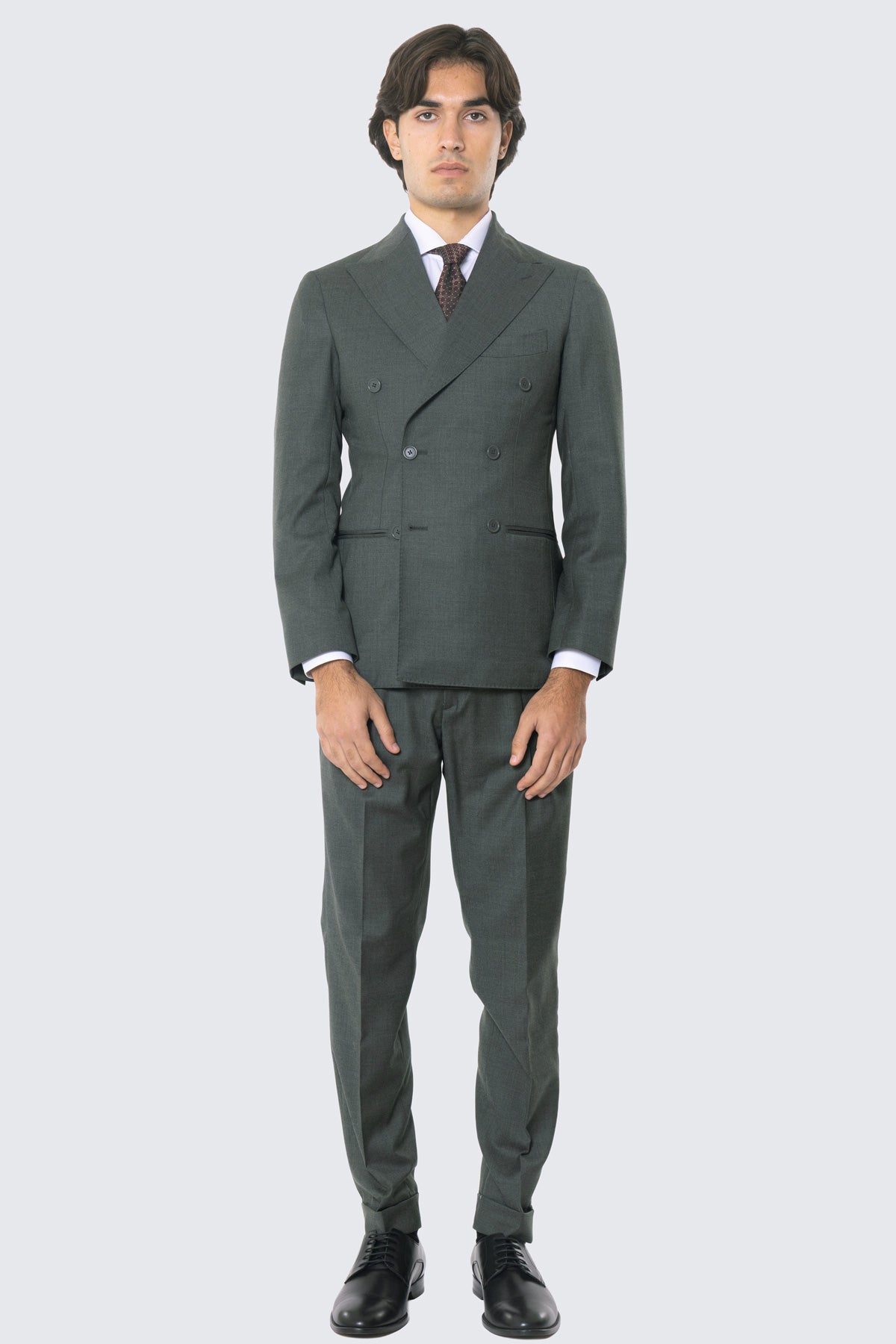 Grüner Anzug mit zweireihigem Jackett, steigendem Revers, Leistentaschen und High-Waist-Hose mit doppelten Bundfalten und 5 cm Aufschlag, 100 % Wolle Flanell Carillo Drapers