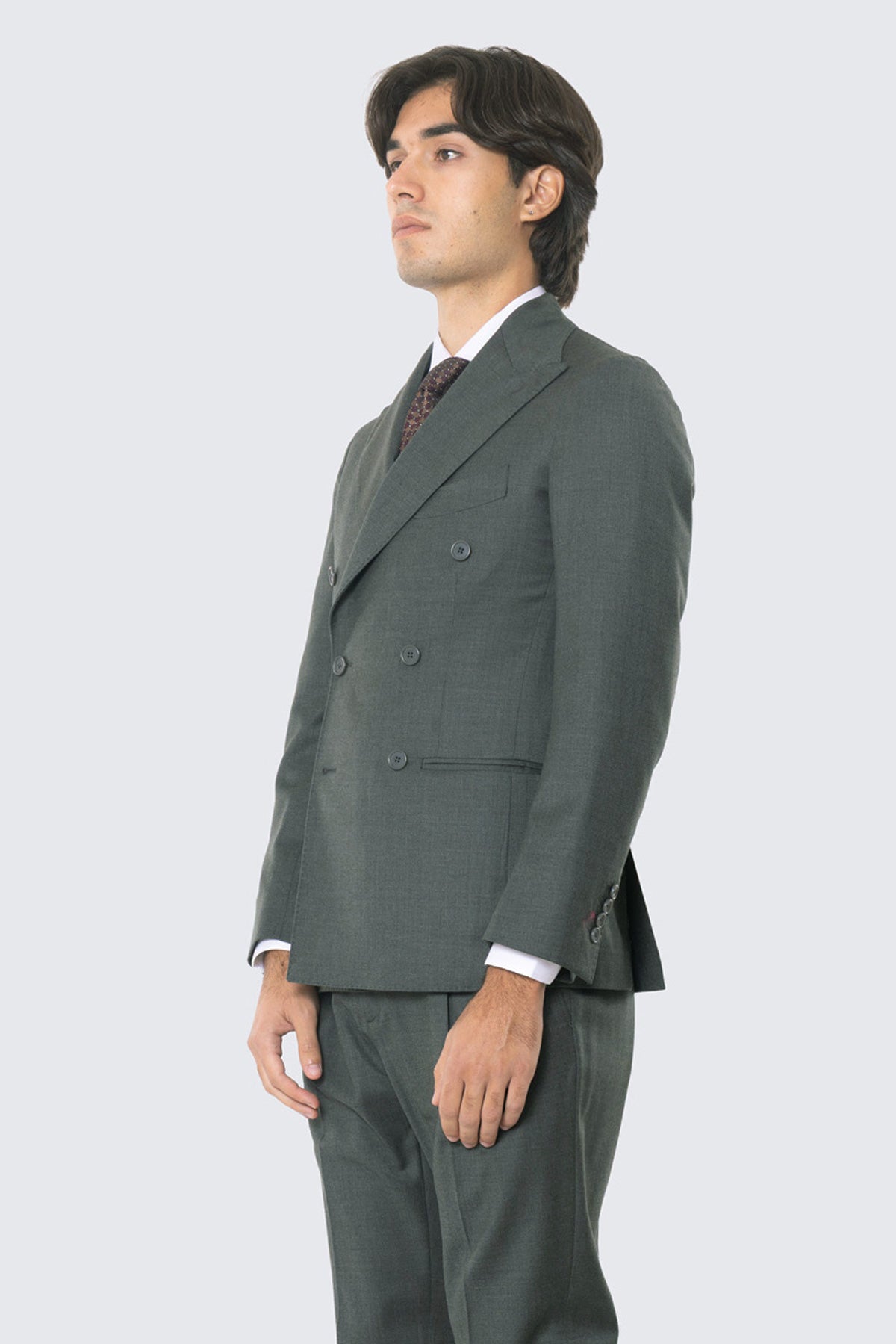 Grüner Anzug mit zweireihigem Jackett, steigendem Revers, Leistentaschen und High-Waist-Hose mit doppelten Bundfalten und 5 cm Aufschlag, 100 % Wolle Flanell Carillo Drapers