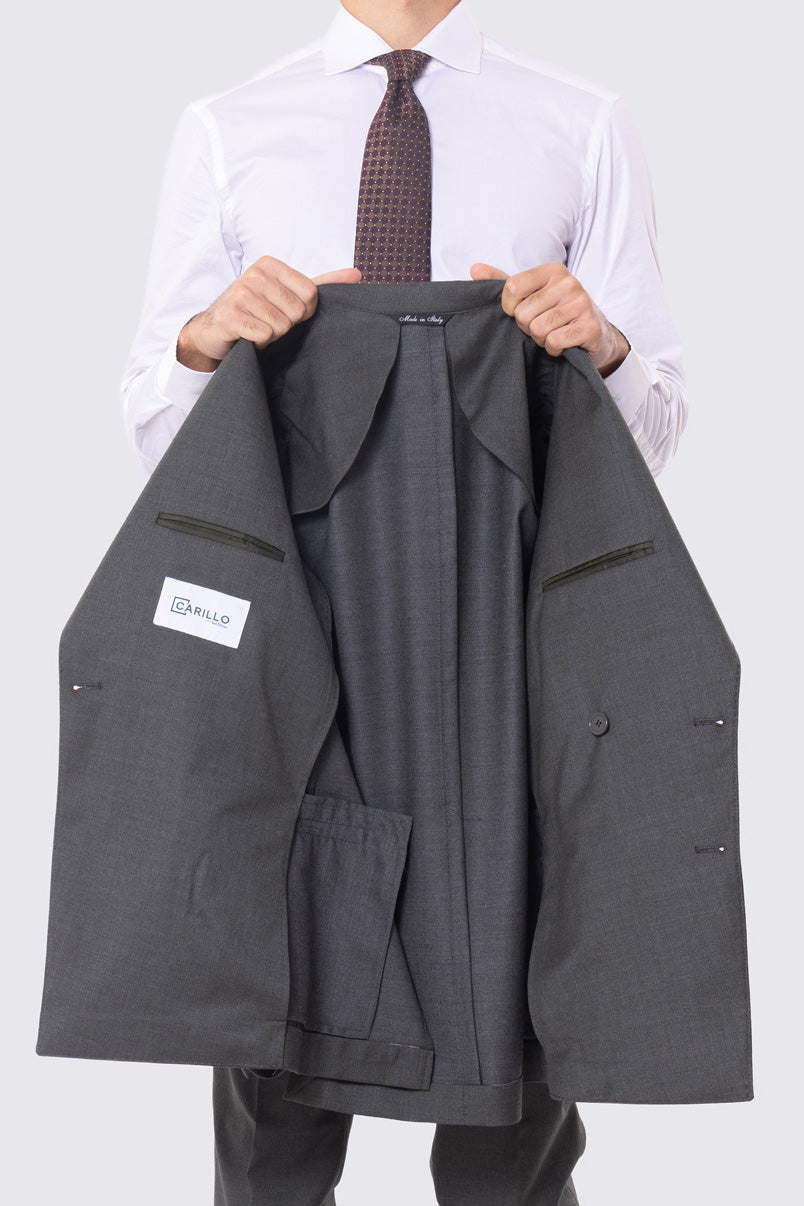 Abito verde con giacca Doppiopetto rever a lancia tasche a filo e pantalone vita alta con doppia pinces e risvolto 5cm 100% lana Flanella Carillo Drapers
