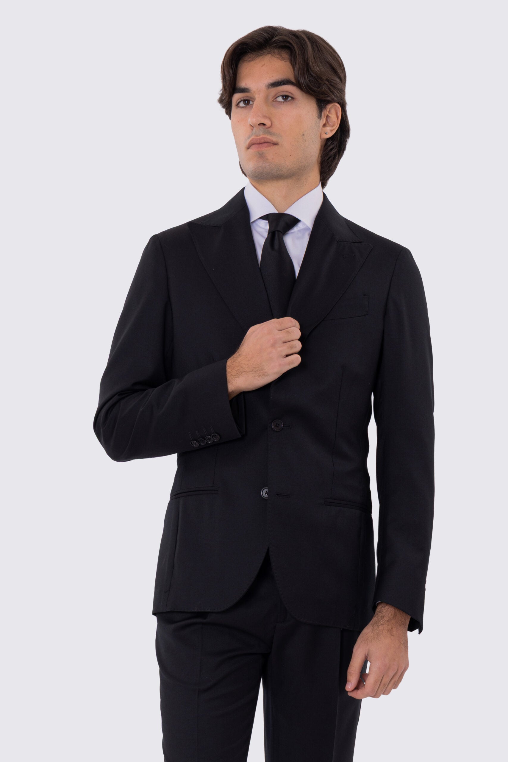 Abito uomo Monopetto nero fresco lana super 110's Tessuti in esclusiva Sartoria Carillo completamente sfoderato con Rever a lancia e tasche a filetto
