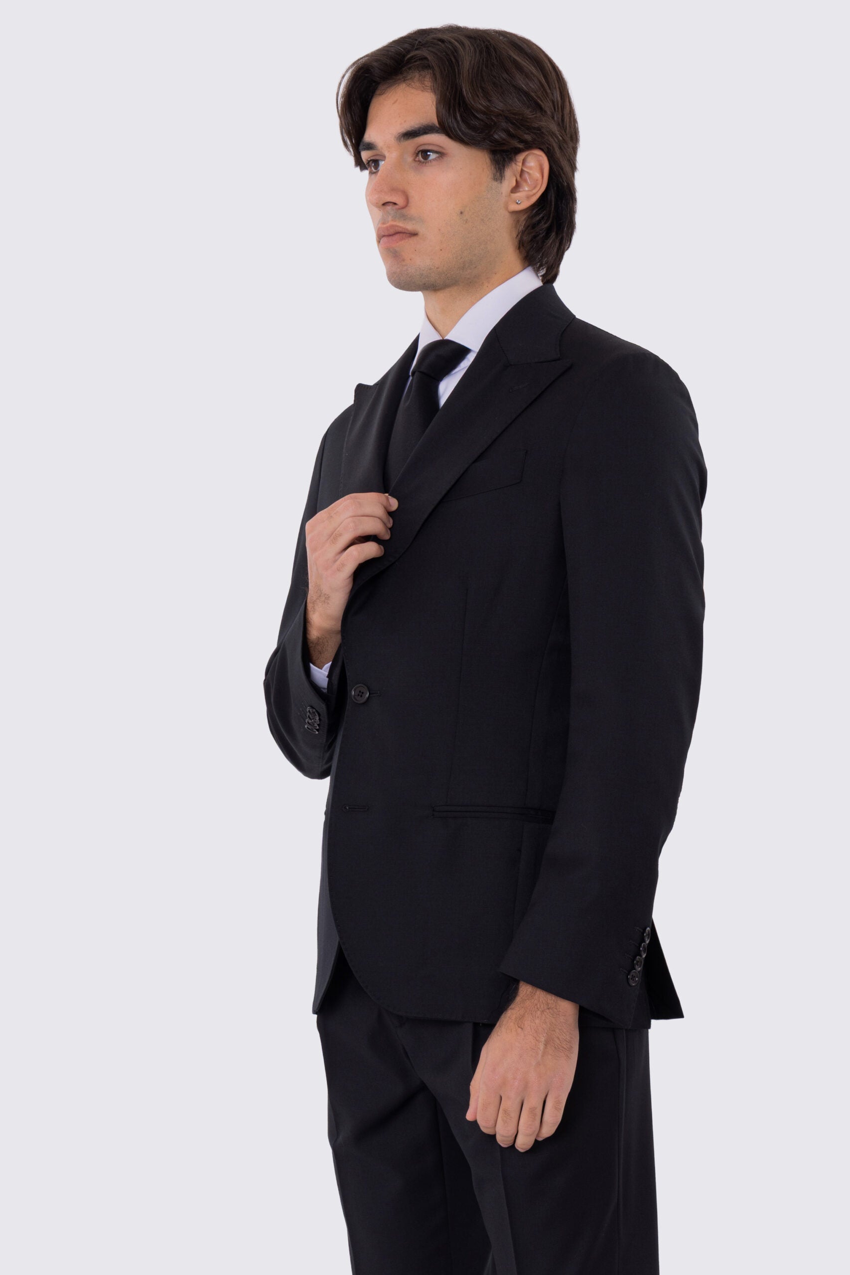 Abito uomo Monopetto nero fresco lana super 110's Tessuti in esclusiva Sartoria Carillo completamente sfoderato con Rever a lancia e tasche a filetto