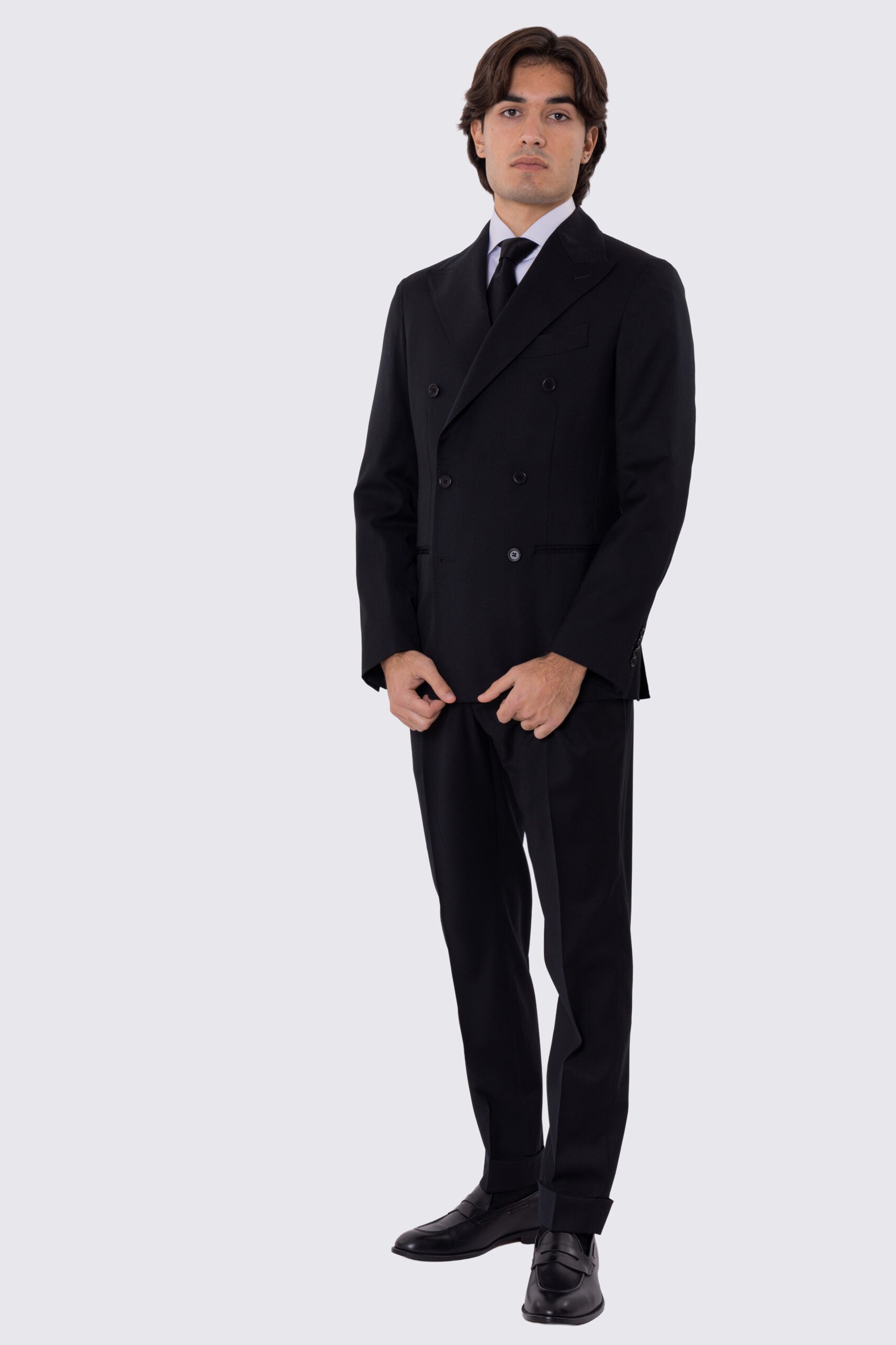 Abito uomo Doppiopetto nero fresco lana super 110's Tessuti in esclusiva Sartoria Carillo completamente sfoderato con Rever a lancia e tasche a filetto