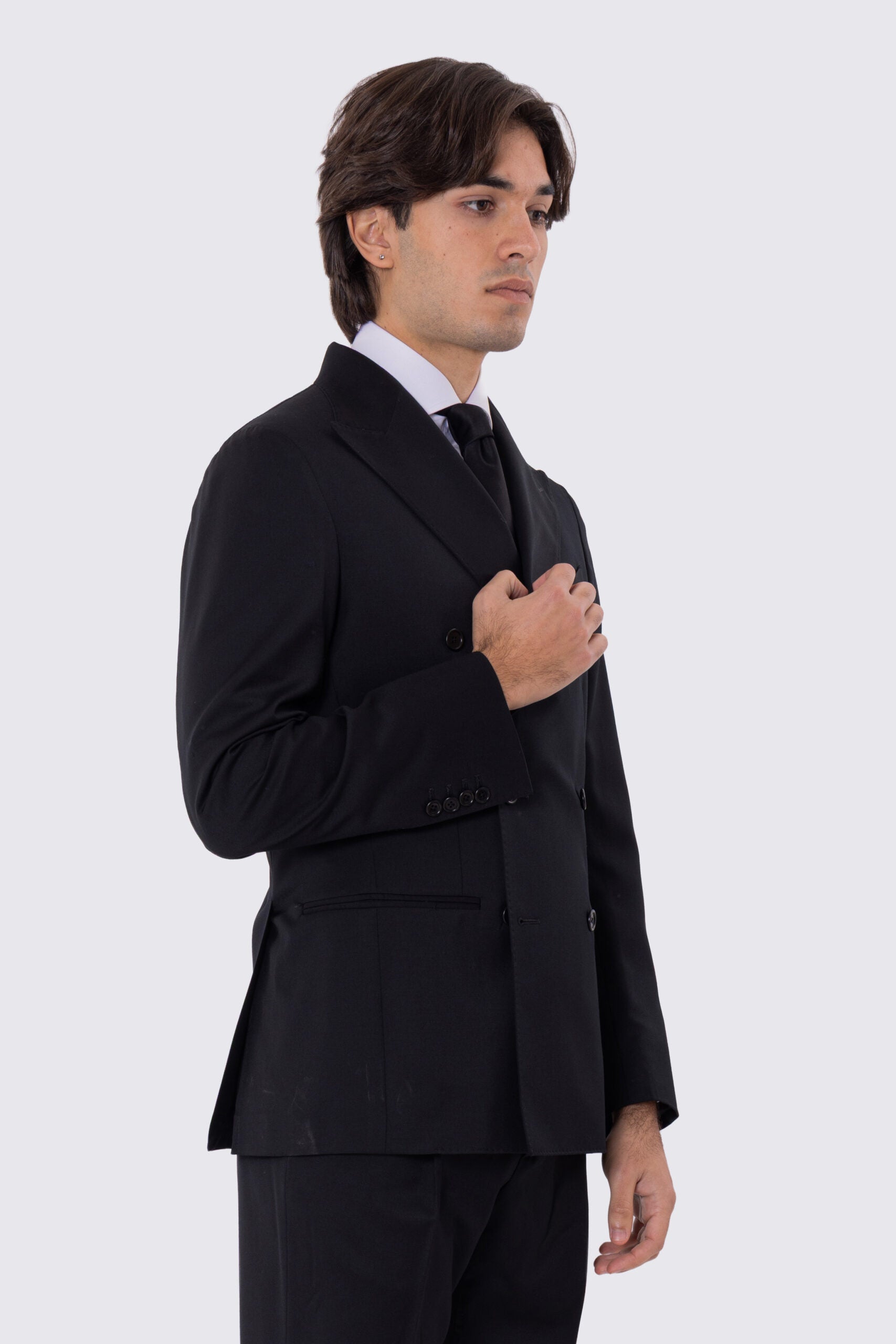 Abito uomo Doppiopetto nero fresco lana super 110's Tessuti in esclusiva Sartoria Carillo completamente sfoderato con Rever a lancia e tasche a filetto