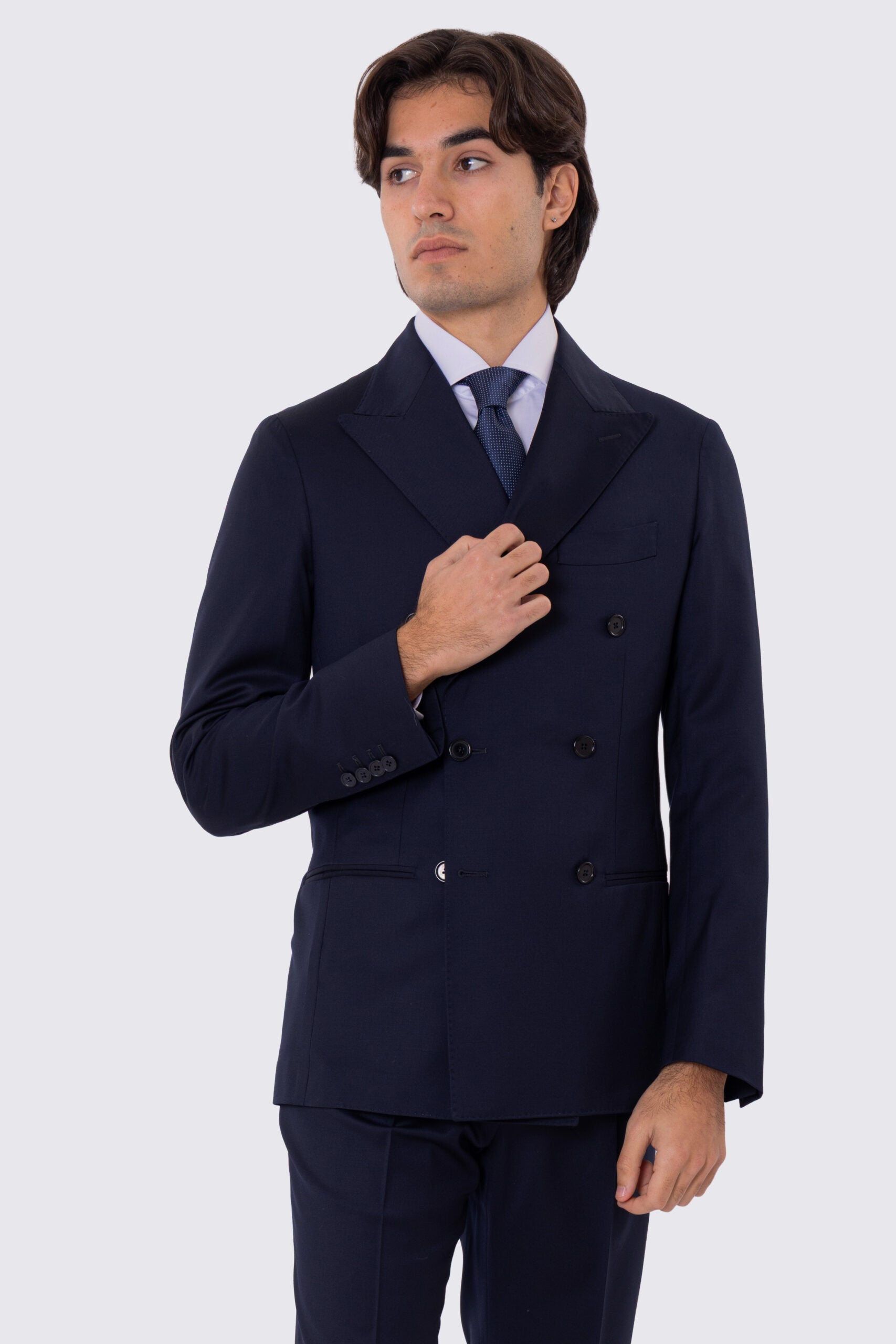 Abito uomo Doppiopetto blu notte fresco lana super 110's Tessuti in esclusiva Sartoria Carillo completamente sfoderato con Rever a lancia e tasche a filetto..
