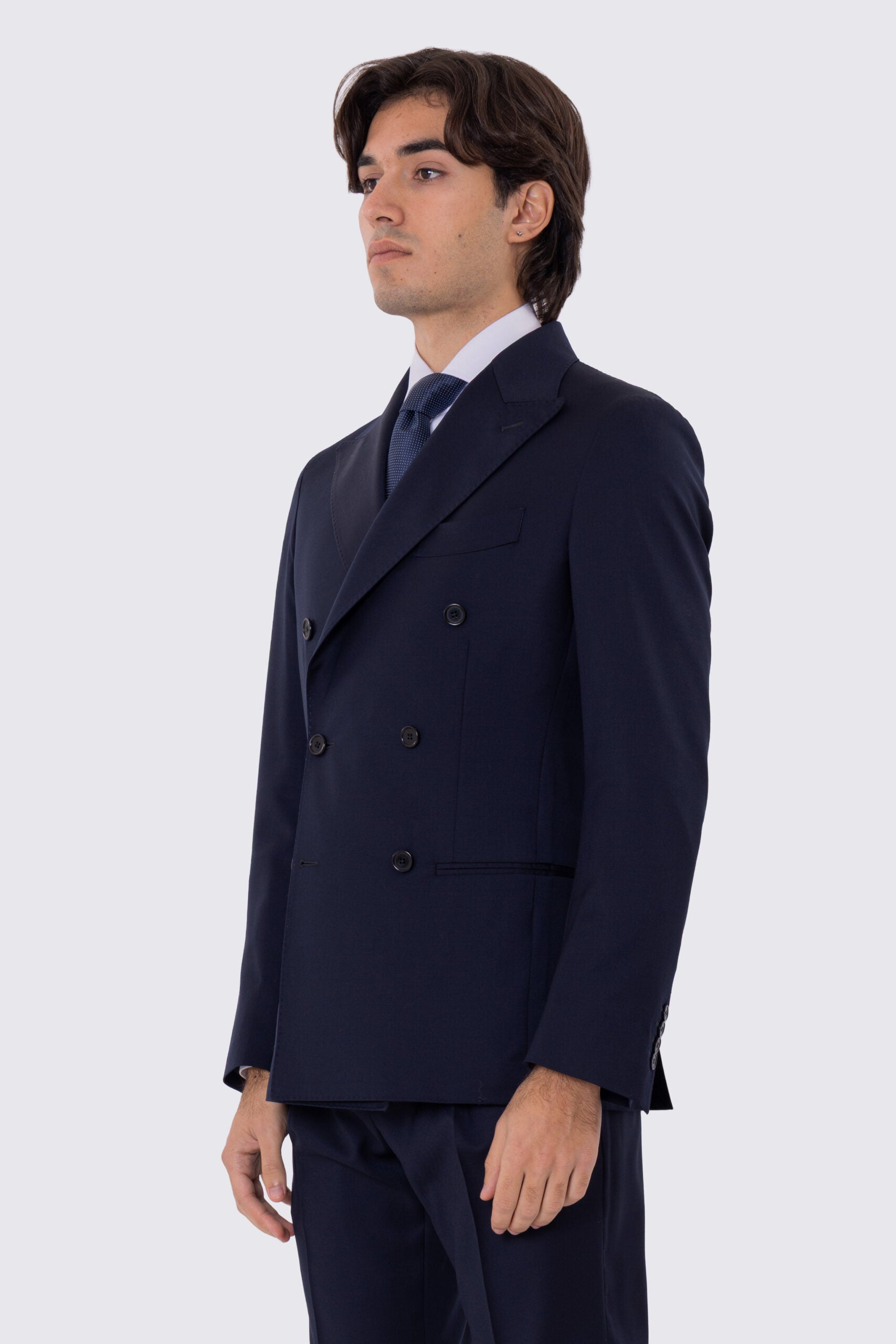 Abito uomo Doppiopetto blu notte fresco lana super 110's Tessuti in esclusiva Sartoria Carillo completamente sfoderato con Rever a lancia e tasche a filetto..