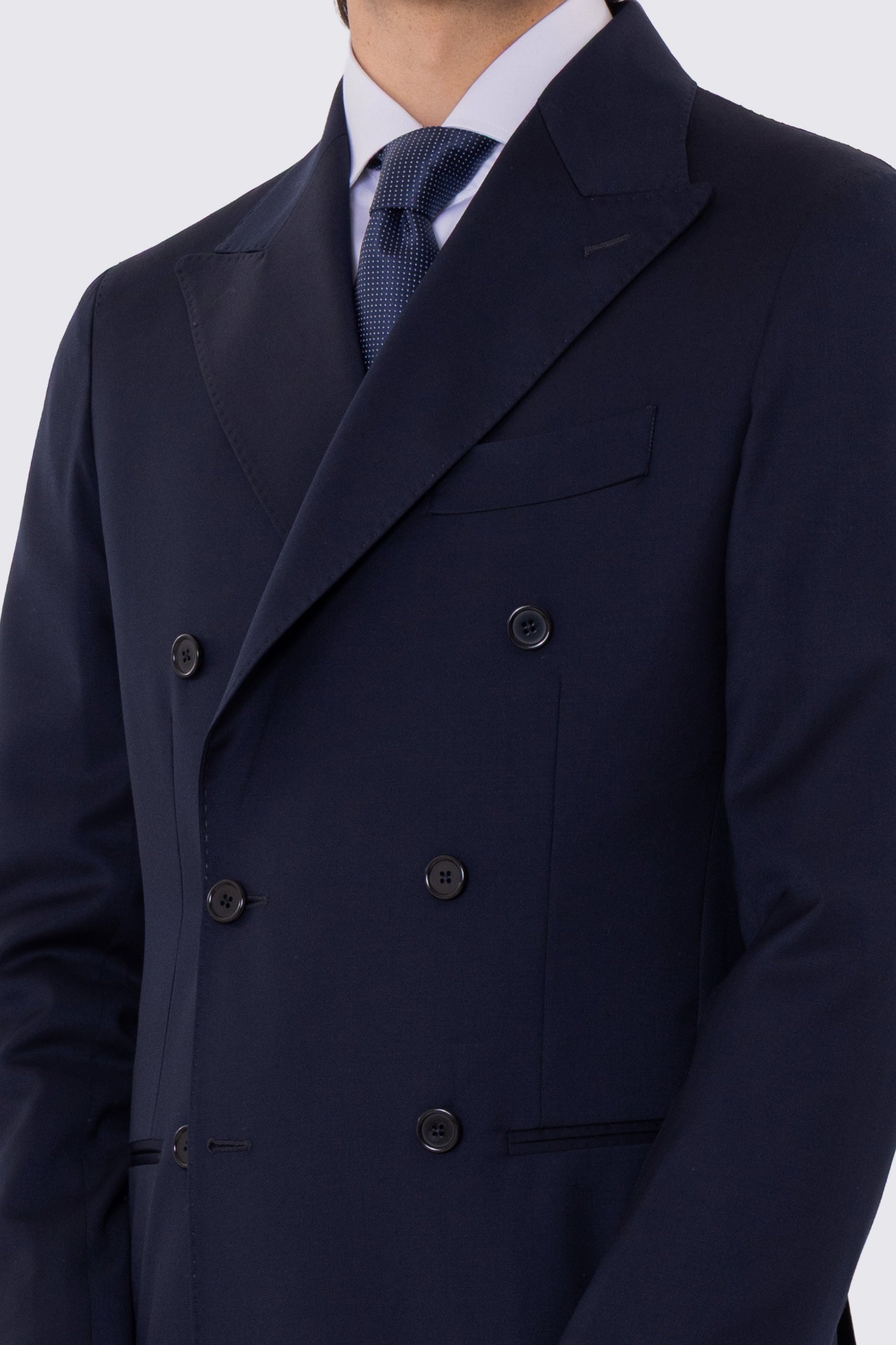 Abito uomo Doppiopetto blu notte fresco lana super 110's Tessuti in esclusiva Sartoria Carillo completamente sfoderato con Rever a lancia e tasche a filetto..