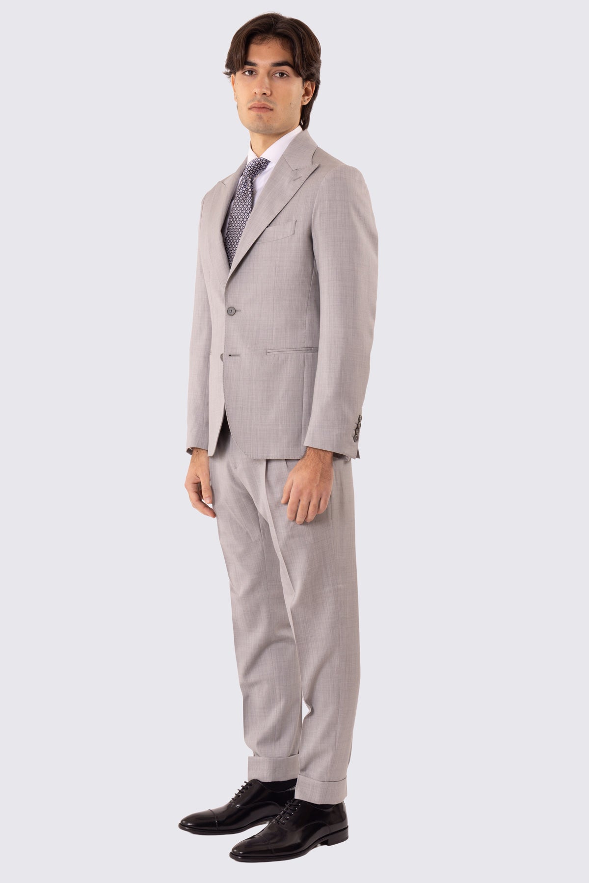 Abito uomo Monopetto grigio chiaro fresco lana super 110's Tessuti in esclusiva Sartoria Carillo completamente sfoderato con Rever a lancia e tasche a filetto