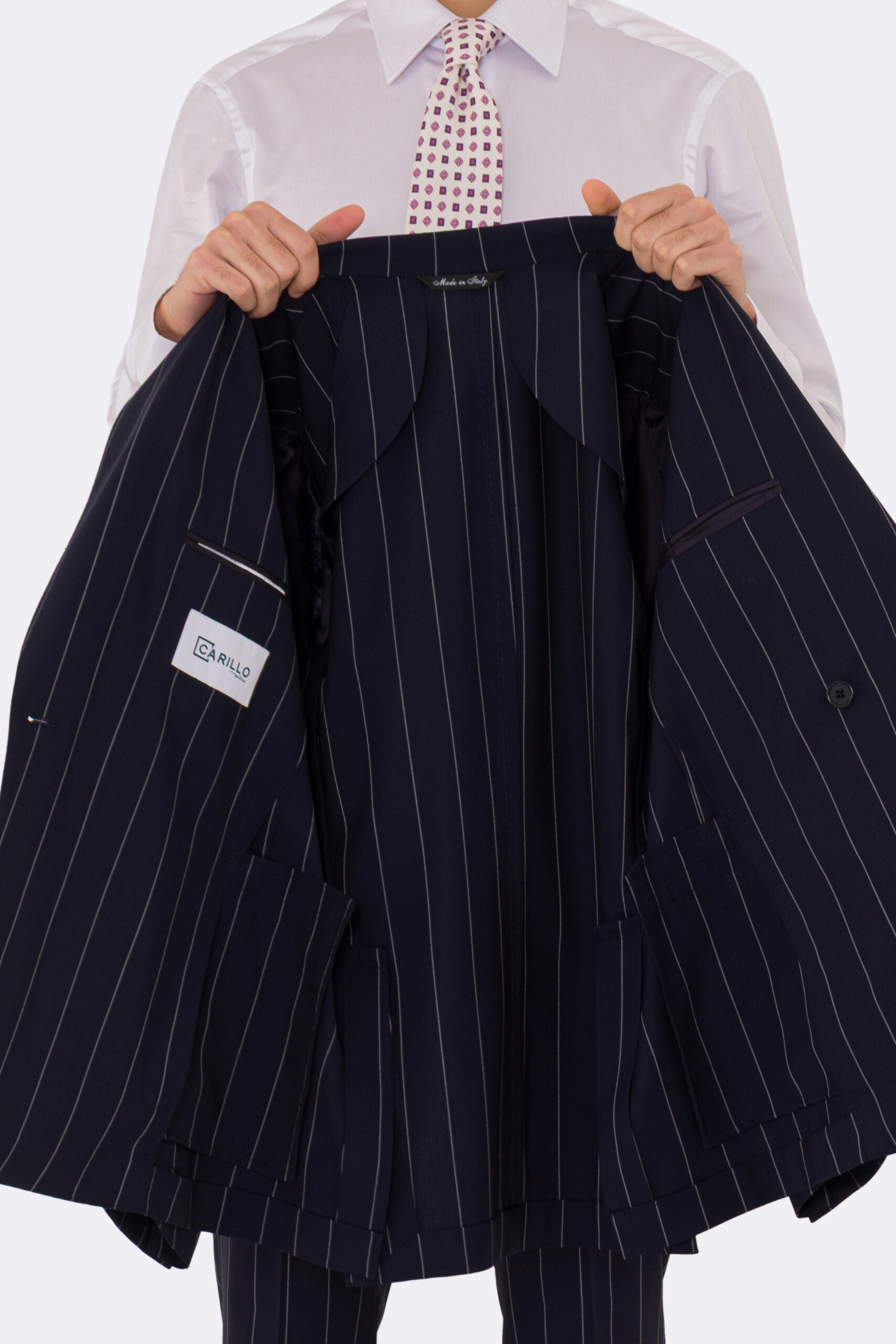 Abito uomo Doppiopetto blu gessato bianco fresco lana super 110's Tessuti in esclusiva Sartoria Carillo completamente sfoderato con Rever a lancia e tasche a filetto