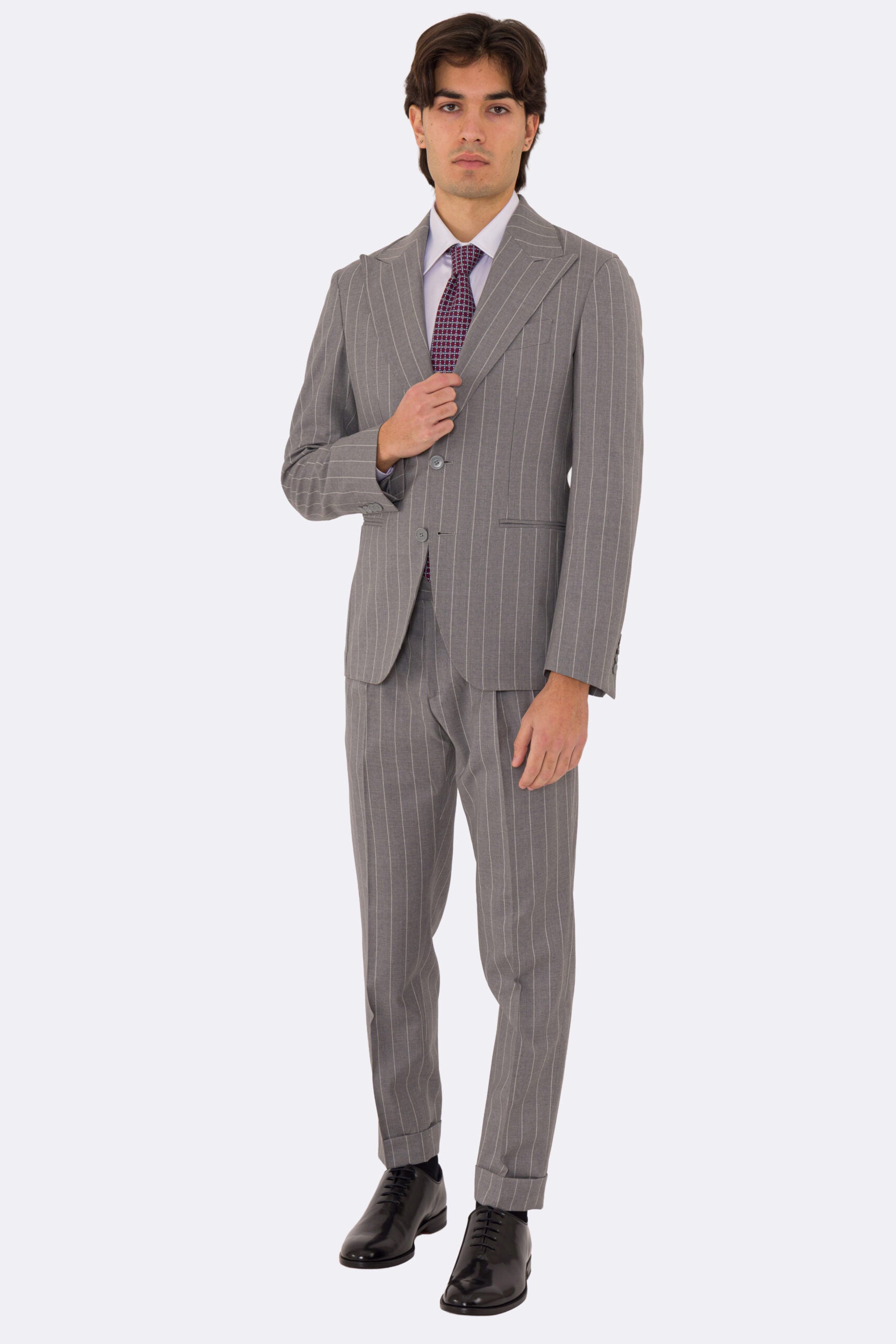 Abito uomo Monopetto grigio gessato bianco fresco lana super 110's Tessuti in esclusiva Sartoria Carillo completamente sfoderato con Rever a lancia e tasche a filetto
