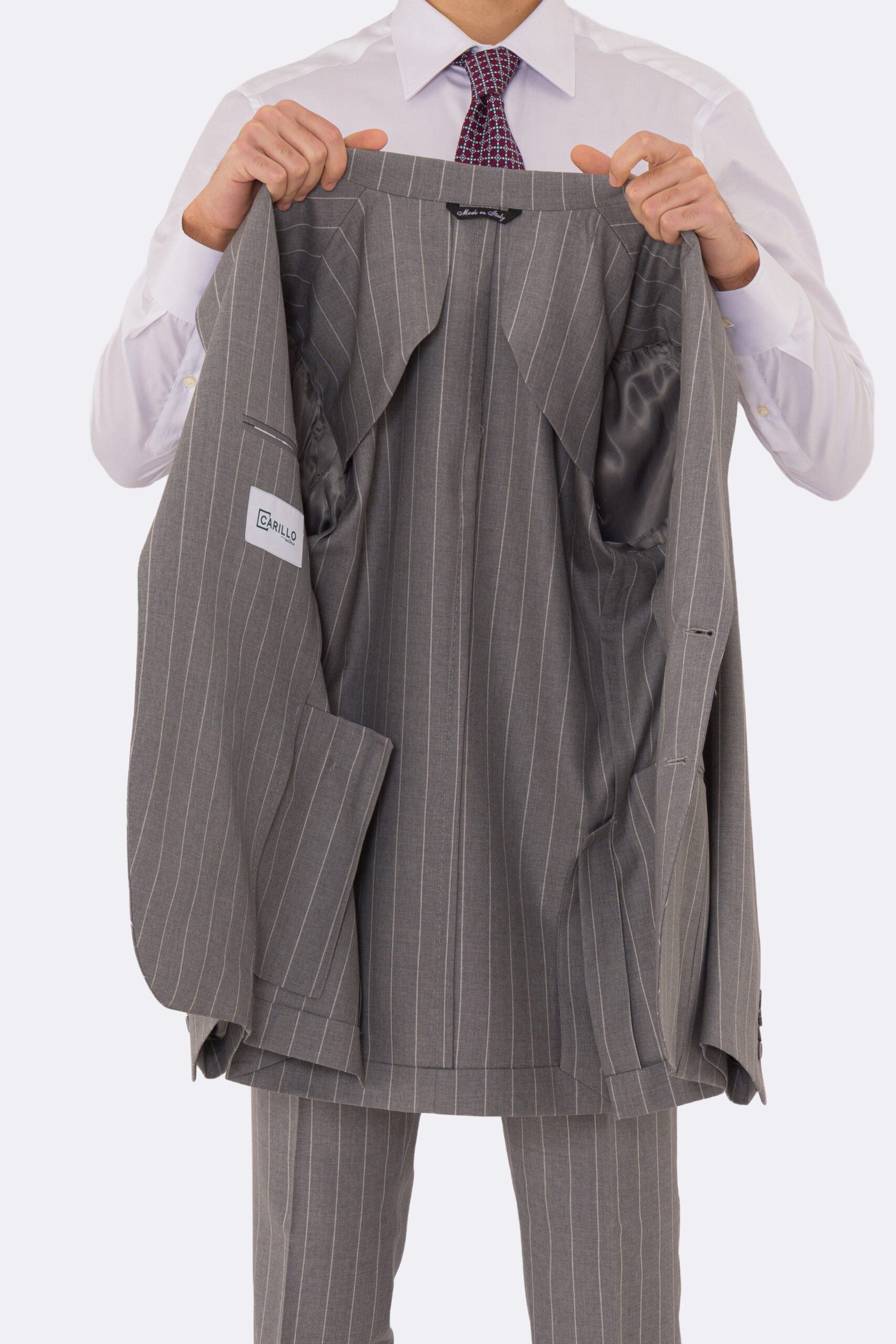 Abito uomo Monopetto grigio gessato bianco fresco lana super 110's Tessuti in esclusiva Sartoria Carillo completamente sfoderato con Rever a lancia e tasche a filetto