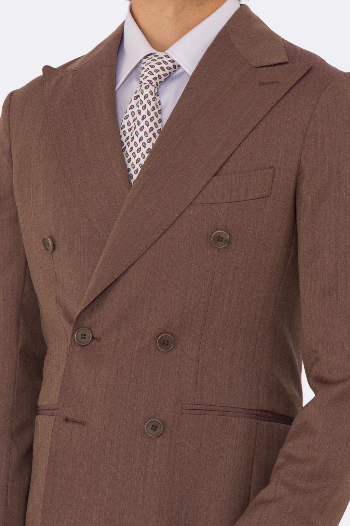 Abito uomo Doppiopetto Marrone Solaro fresco lana super 110's Tessuti in esclusiva Sartoria Carillo completamente sfoderato con Rever a lancia e tasche a filetto.