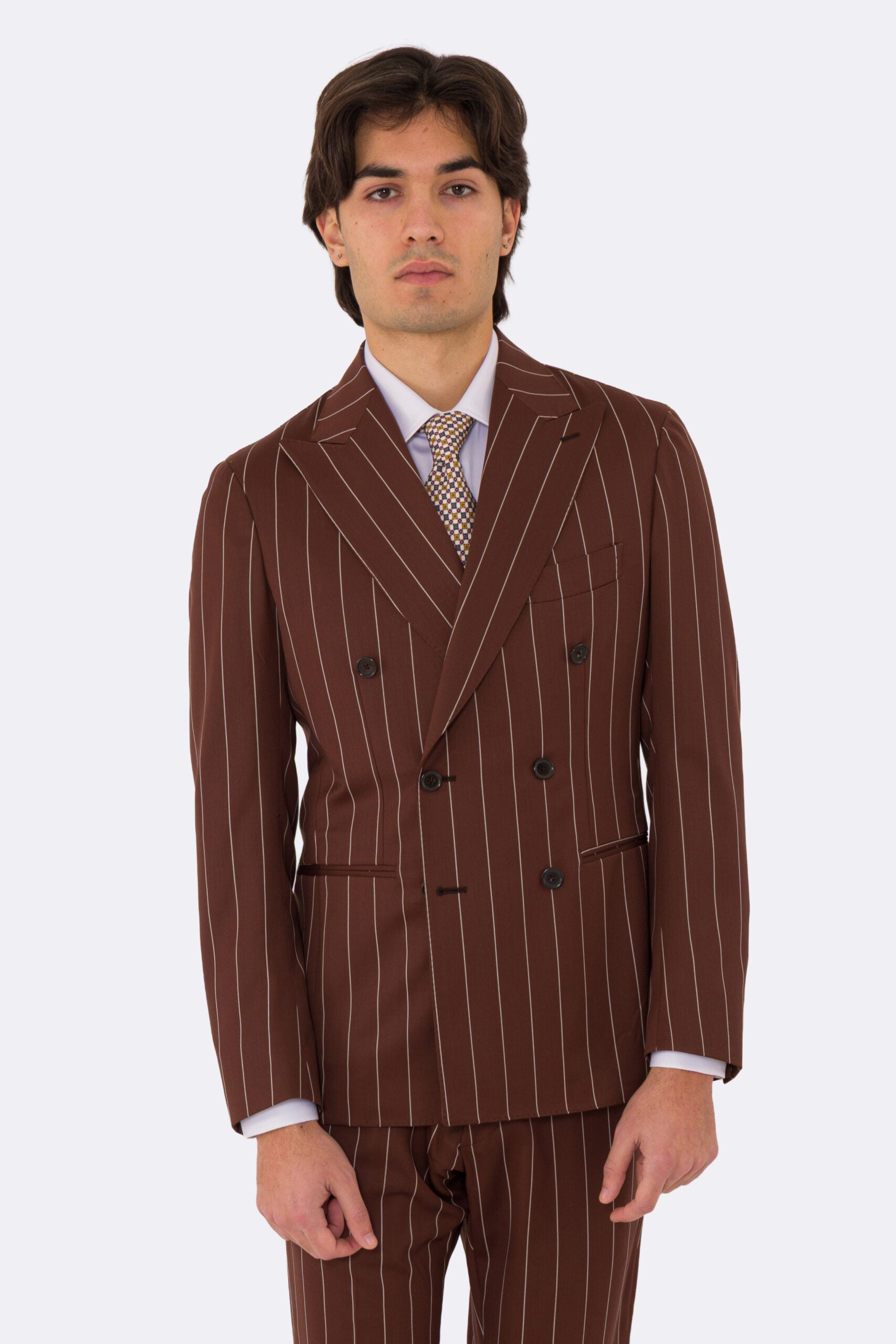 Abito uomo Doppiopetto Coccio gessato fresco lana super 130's Double Twisted Tessuti Ariston Napoli completamente sfoderato con Rever a lancia e tasche a filetto