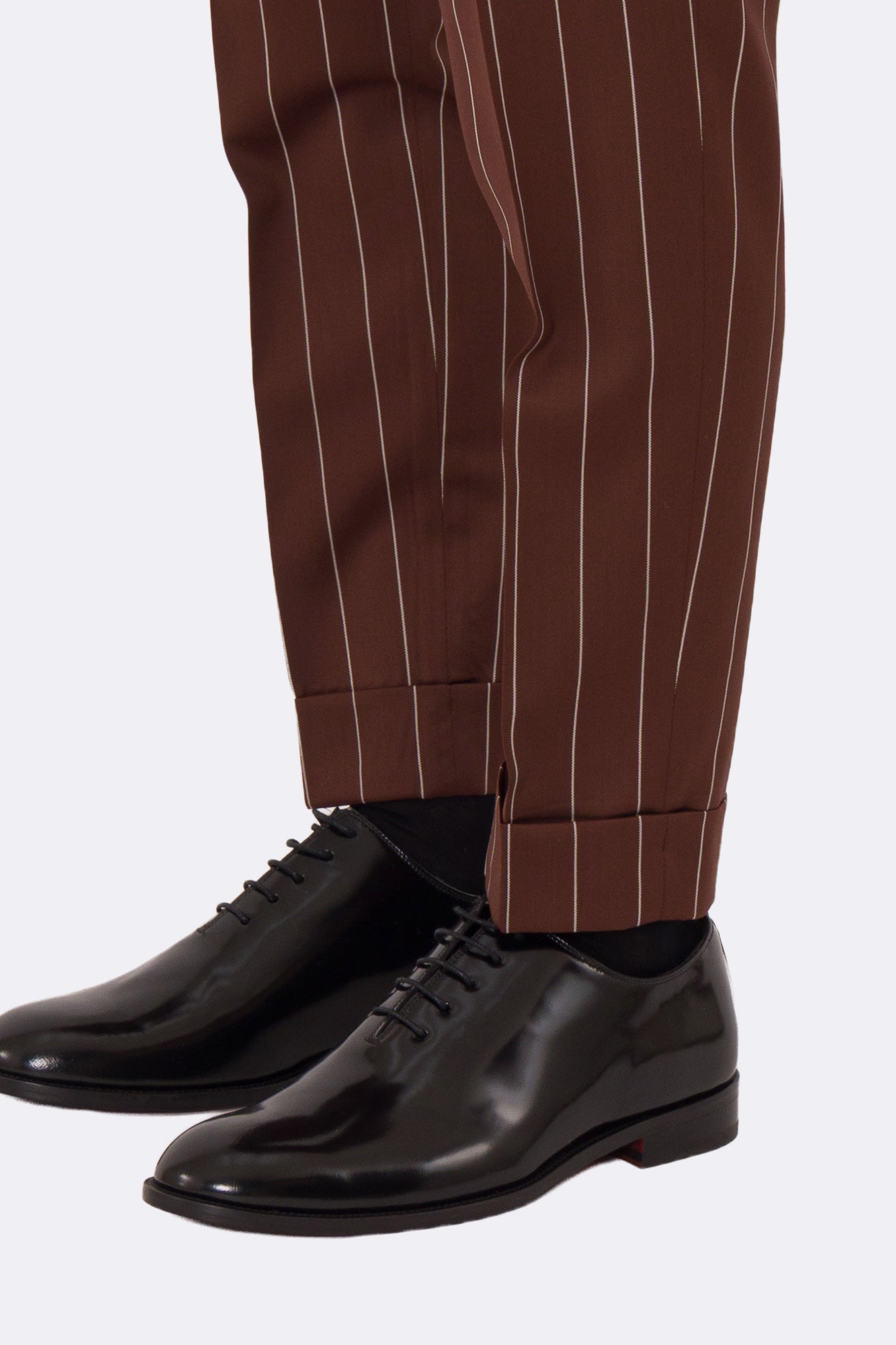 Abito uomo Doppiopetto Coccio gessato fresco lana super 130's Double Twisted Tessuti Ariston Napoli completamente sfoderato con Rever a lancia e tasche a filetto