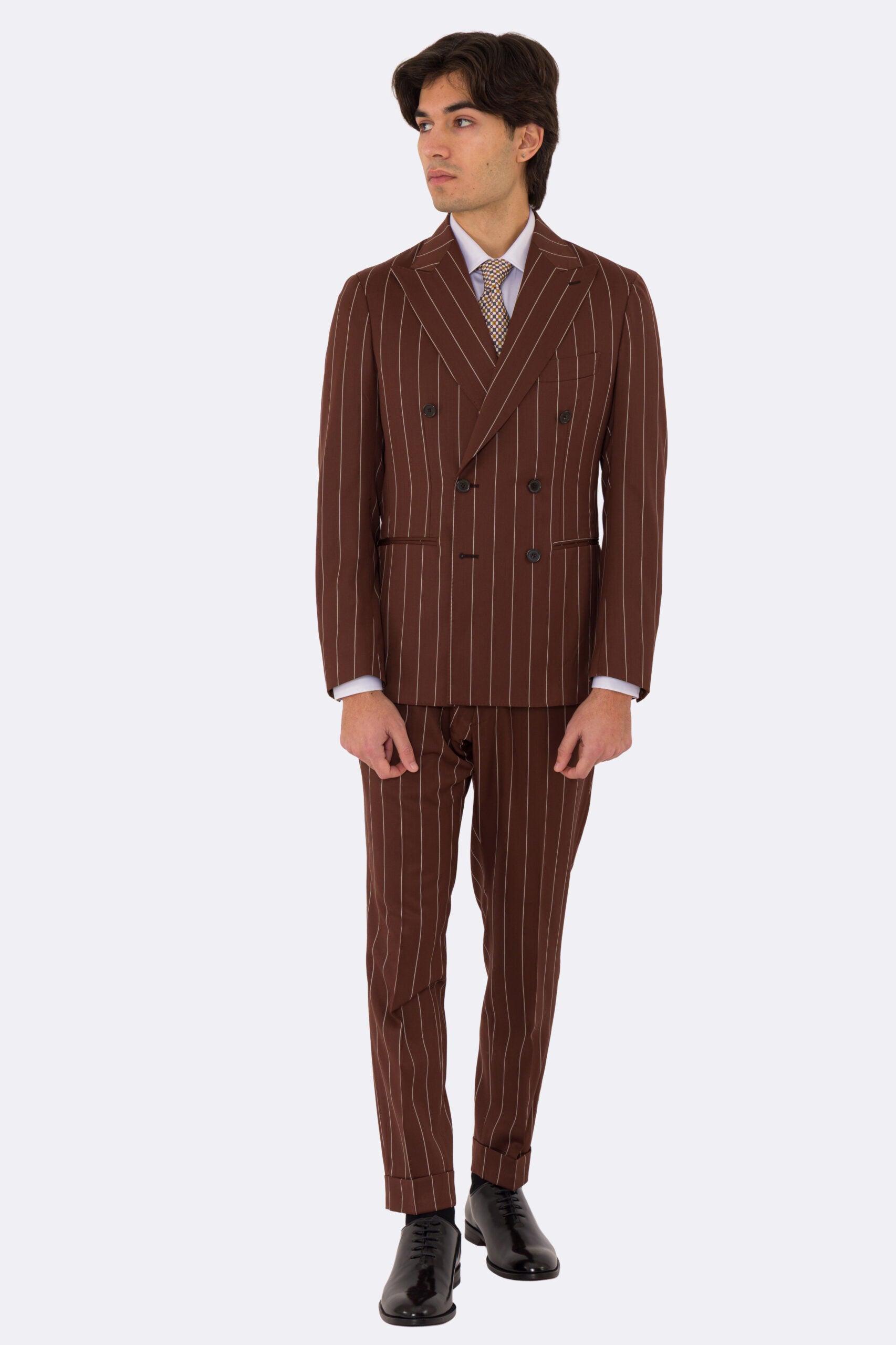 Abito uomo Doppiopetto Coccio gessato fresco lana super 130's Double Twisted Tessuti Ariston Napoli completamente sfoderato con Rever a lancia e tasche a filetto