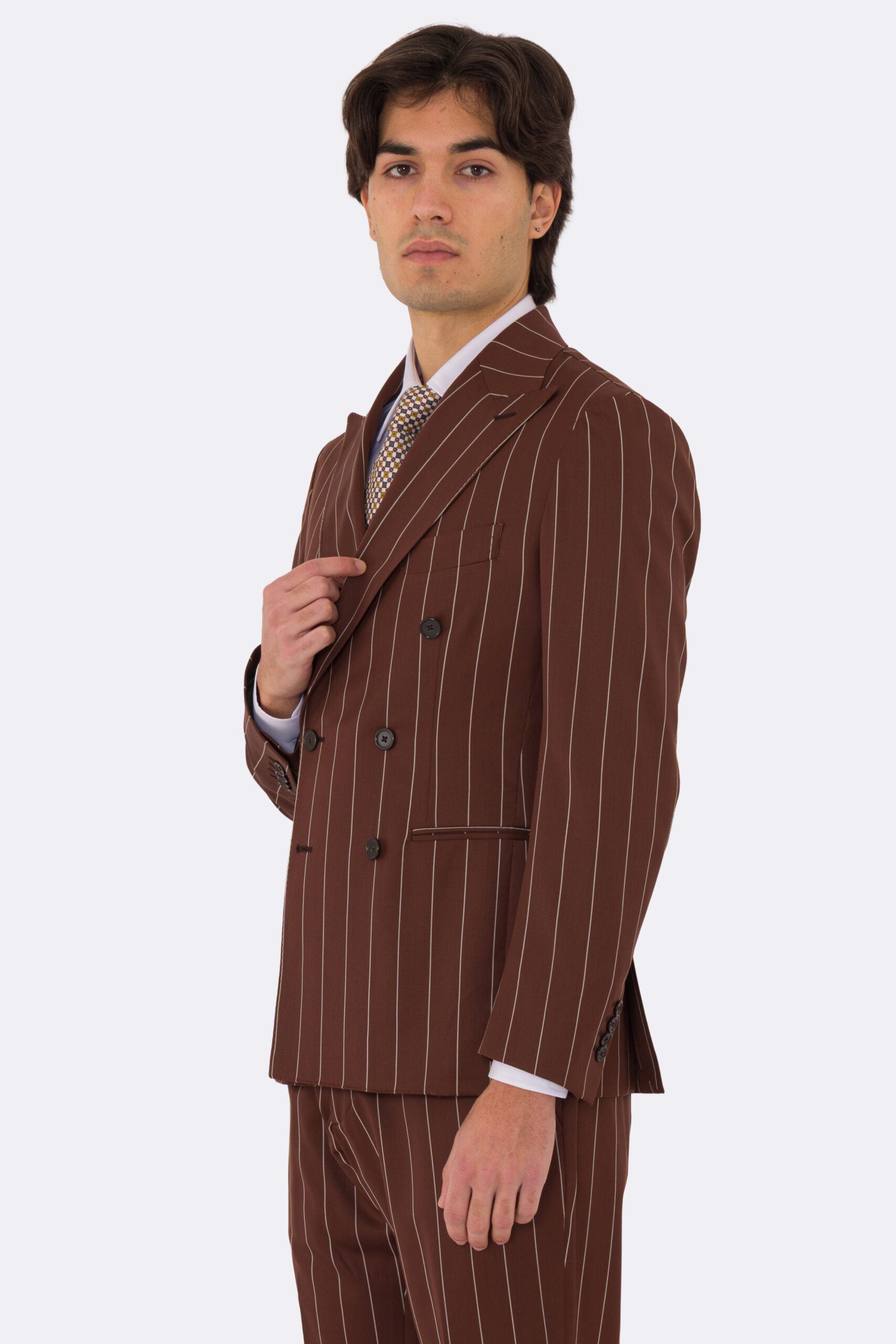 Abito uomo Doppiopetto Coccio gessato fresco lana super 130's Double Twisted Tessuti Ariston Napoli completamente sfoderato con Rever a lancia e tasche a filetto