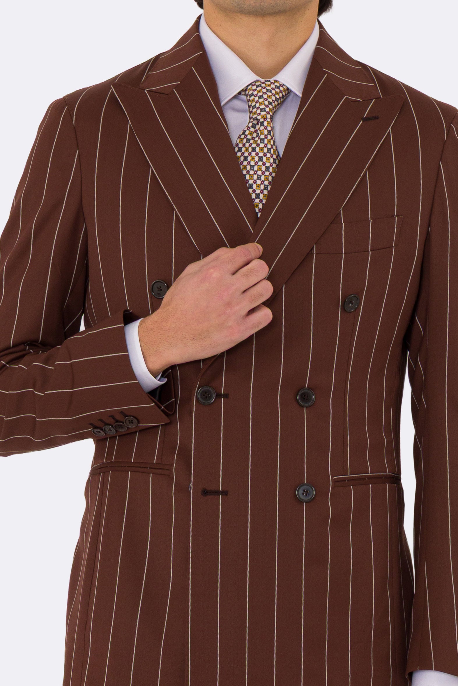 Abito uomo Doppiopetto Coccio gessato fresco lana super 130's Double Twisted Tessuti Ariston Napoli completamente sfoderato con Rever a lancia e tasche a filetto