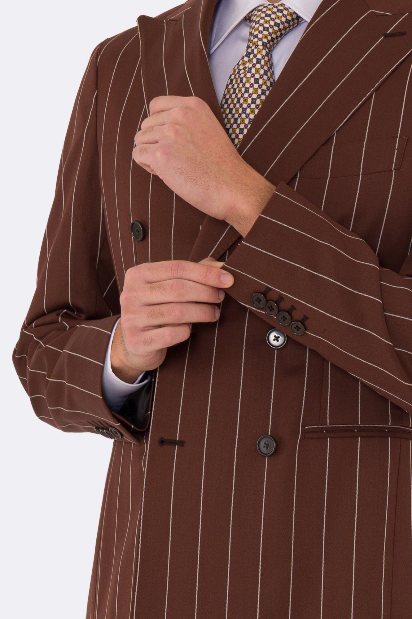 Abito uomo Doppiopetto Coccio gessato fresco lana super 130's Double Twisted Tessuti Ariston Napoli completamente sfoderato con Rever a lancia e tasche a filetto