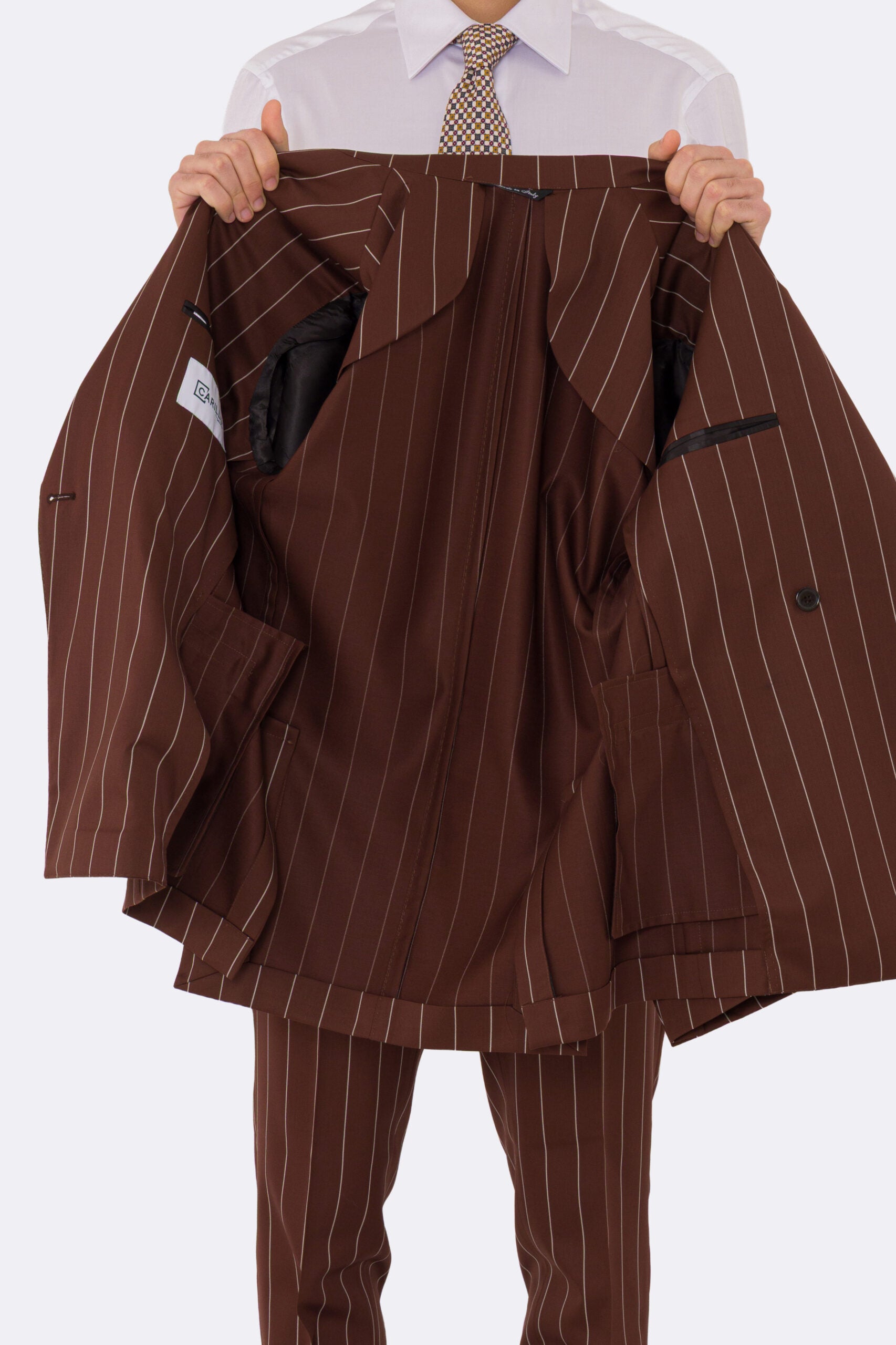 Abito uomo Doppiopetto Coccio gessato fresco lana super 130's Double Twisted Tessuti Ariston Napoli completamente sfoderato con Rever a lancia e tasche a filetto