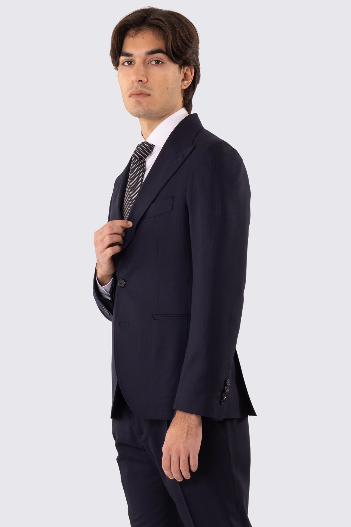 Abito uomo Monopetto Blu spigato fresco lana super 150's Tessuti in esclusiva Sartoria Carillo completamente sfoderato con Rever a lancia e tasche a filetto