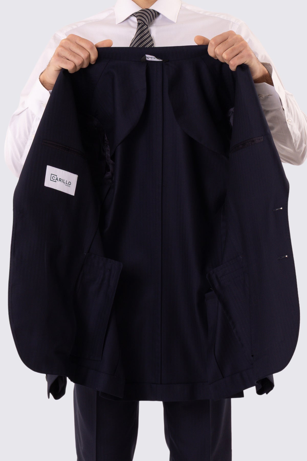 Abito uomo Monopetto Blu spigato fresco lana super 150's Tessuti in esclusiva Sartoria Carillo completamente sfoderato con Rever a lancia e tasche a filetto