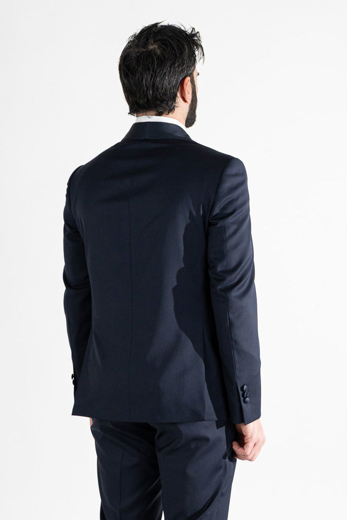 Abito smoking monopetto blu da uomo in fresco lana super 130's Vitale Barberis Canonico con rever a scialle largo in raso con pantalone senza pinces