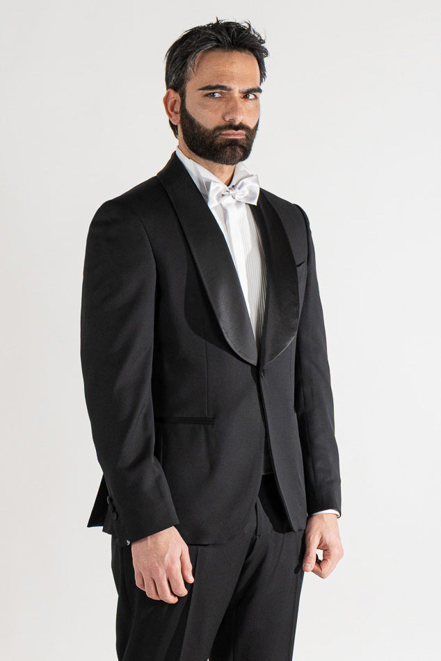 Abito smoking Monopetto nero da uomo in fresco lana super 130's Vitale Barberis Canonico con rever a scialle largo in raso con pantalone senza pinces