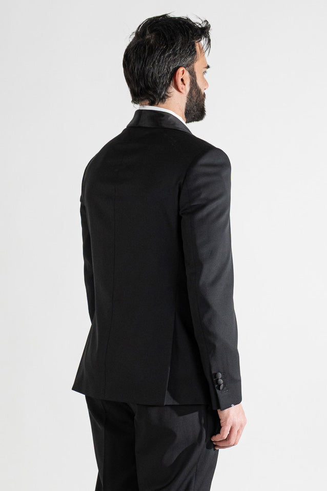Abito smoking Monopetto nero da uomo in fresco lana super 130's Vitale Barberis Canonico con rever a scialle largo in raso con pantalone senza pinces