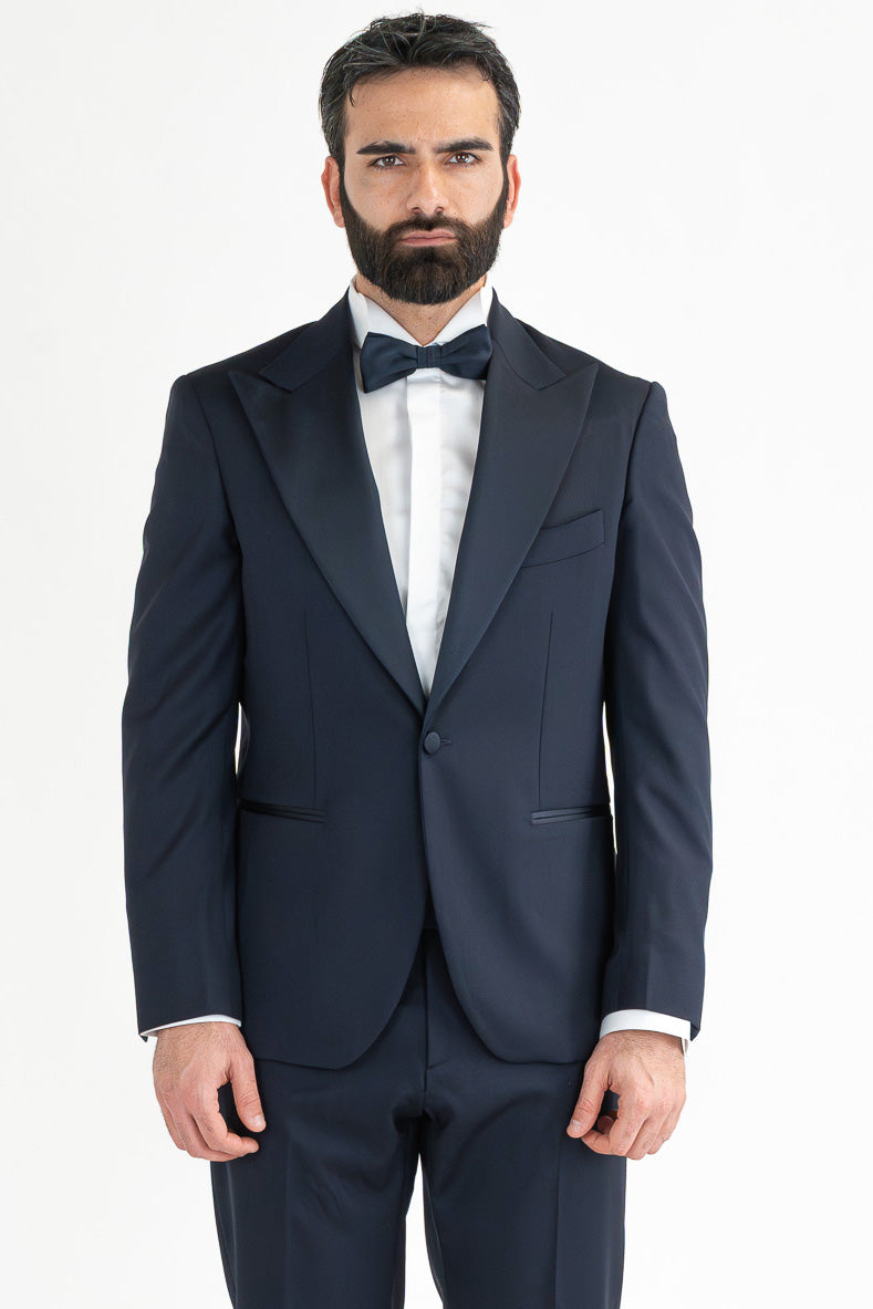 Abito smoking monopetto blu da uomo in fresco lana super 130's Vitale Barberis Canonico con rever a lancia largo in raso con pantalone senza pinces