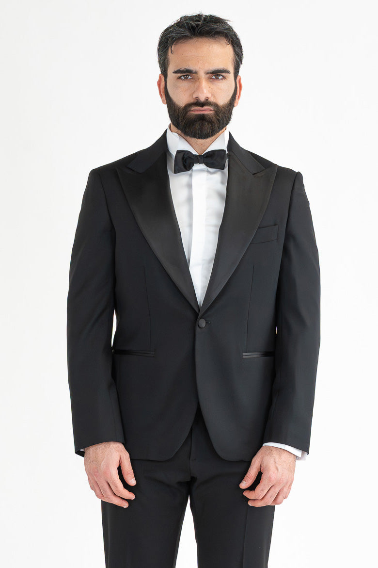 Abito smoking Monopetto nero da uomo in fresco lana super 130's Vitale Barberis Canonico con rever a lancia largo in raso con pantalone senza pinces