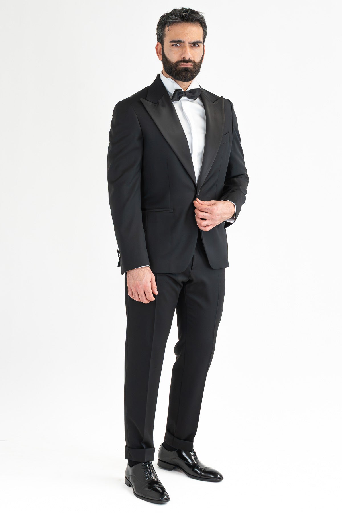 Abito smoking Monopetto nero da uomo in fresco lana super 130's Vitale Barberis Canonico con rever a lancia largo in raso con pantalone senza pinces