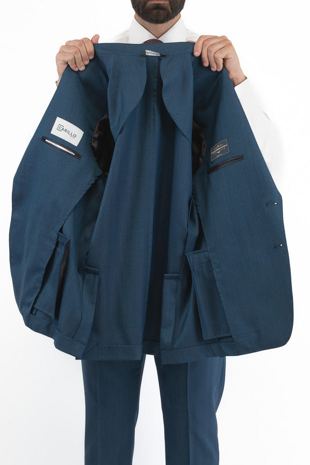 Abito spigato Blu ottanio monopetto fresco lana TessutiVitale Barberis Canonico completamente sfoderato con Rever a lancia e tasche a filetto