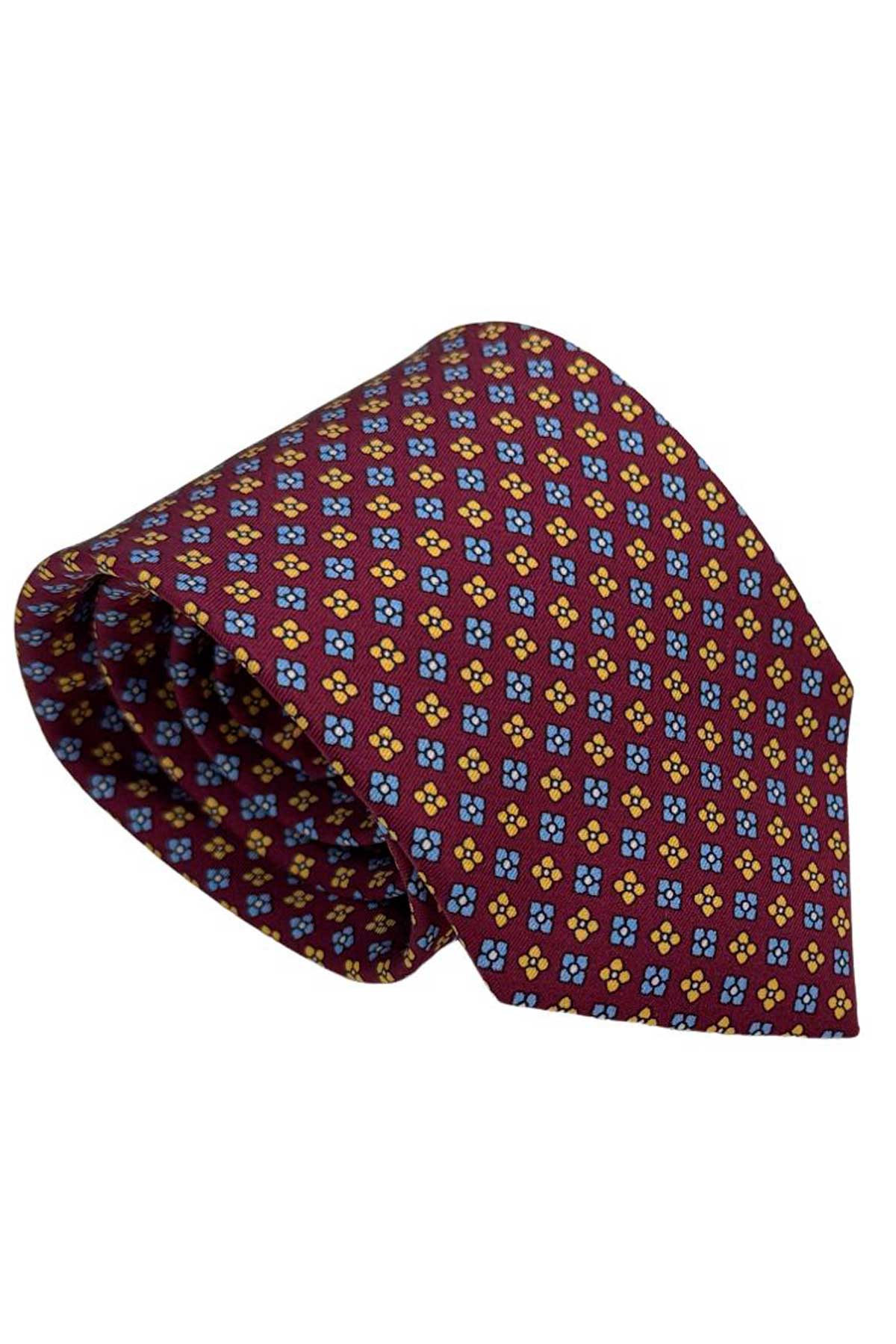 Cravatta uomo bordeaux fantasia in pura seta cucita a mano costruzione 3 piege larghezza 9cm
