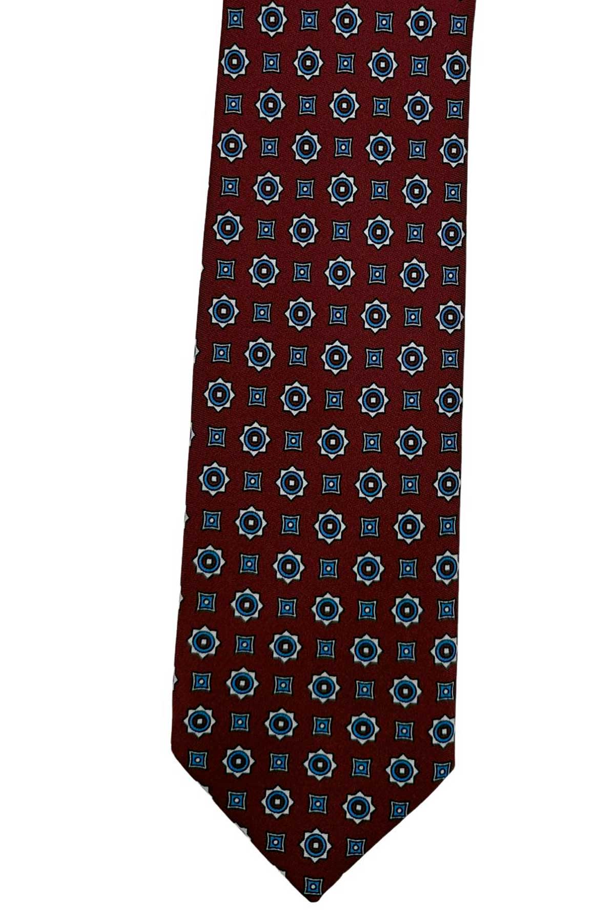 Cravatta uomo bordeaux fantasia in pura seta cucita a mano costruzione 3 piege larghezza 9cm
