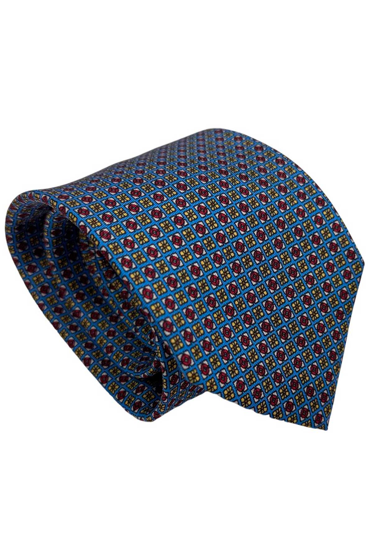 Cravatta uomo celeste fantasia in pura seta cucita a mano costruzione 3 piege larghezza 9cm
