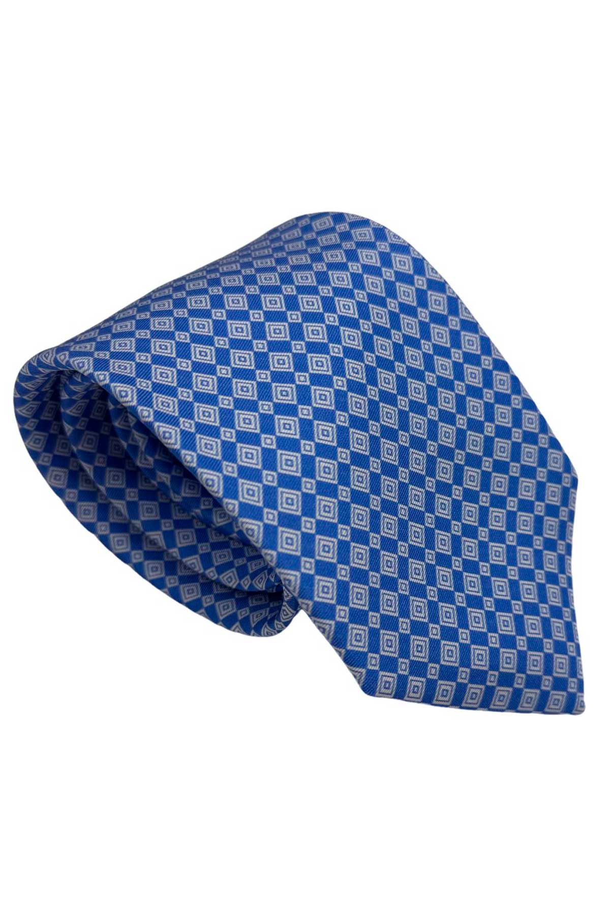 Cravatta uomo celeste fantasia in pura seta cucita a mano costruzione 3 piege larghezza 9cm