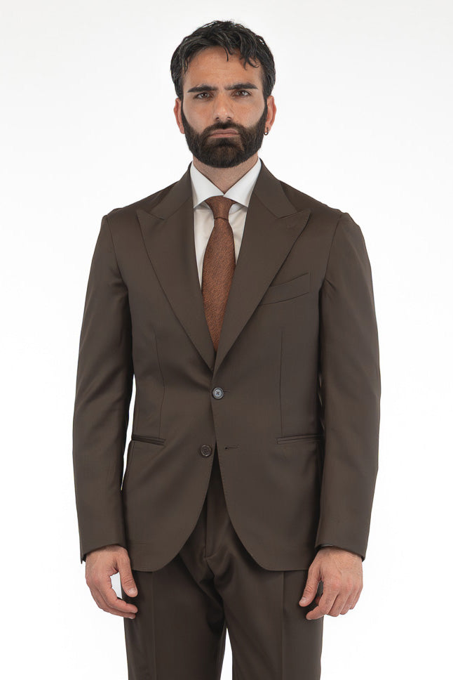 Abito uomo Monopetto marrone fresco lana super 110's Tessuti in esclusiva Sartoria Carillo completamente sfoderato con Rever a lancia e tasche a filetto
