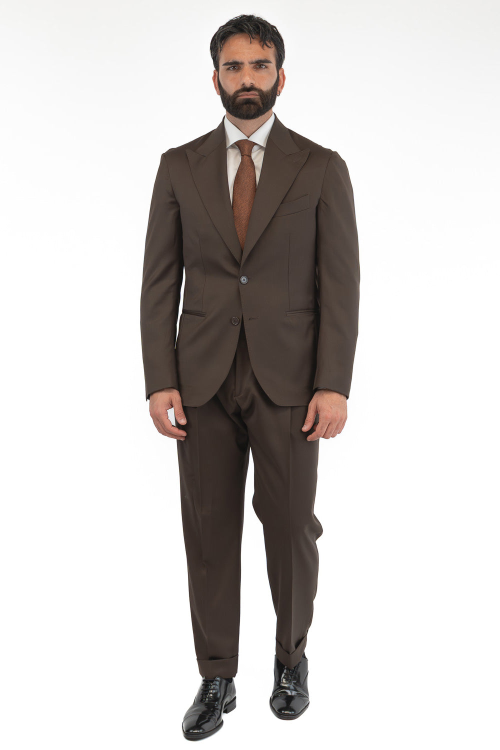 Abito uomo Monopetto marrone fresco lana super 110's Tessuti in esclusiva Sartoria Carillo completamente sfoderato con Rever a lancia e tasche a filetto