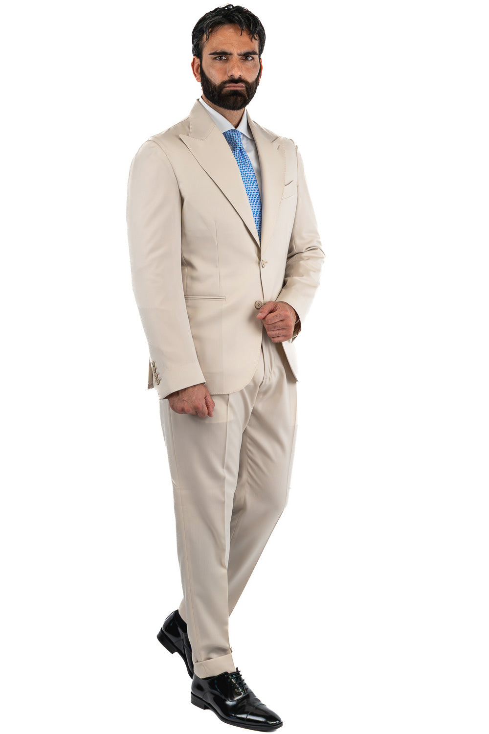 Abito uomo Monopetto beige fresco lana super 110's Tessuti in esclusiva Sartoria Carillo completamente sfoderato con Rever a lancia e tasche a filetto