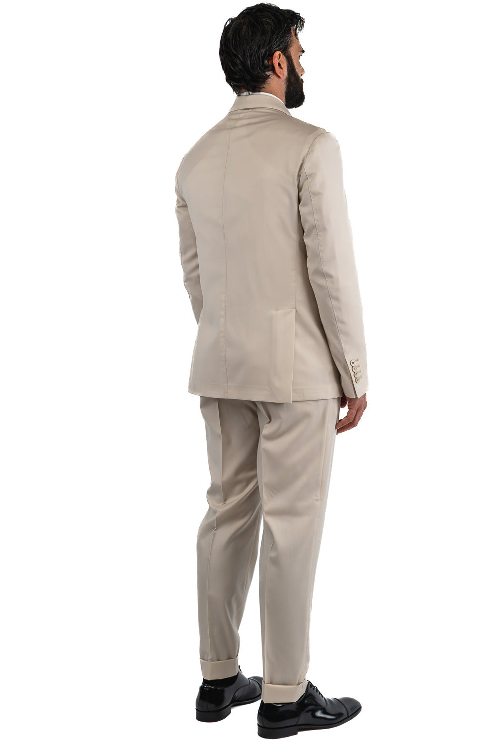 Abito uomo Monopetto beige fresco lana super 110's Tessuti in esclusiva Sartoria Carillo completamente sfoderato con Rever a lancia e tasche a filetto